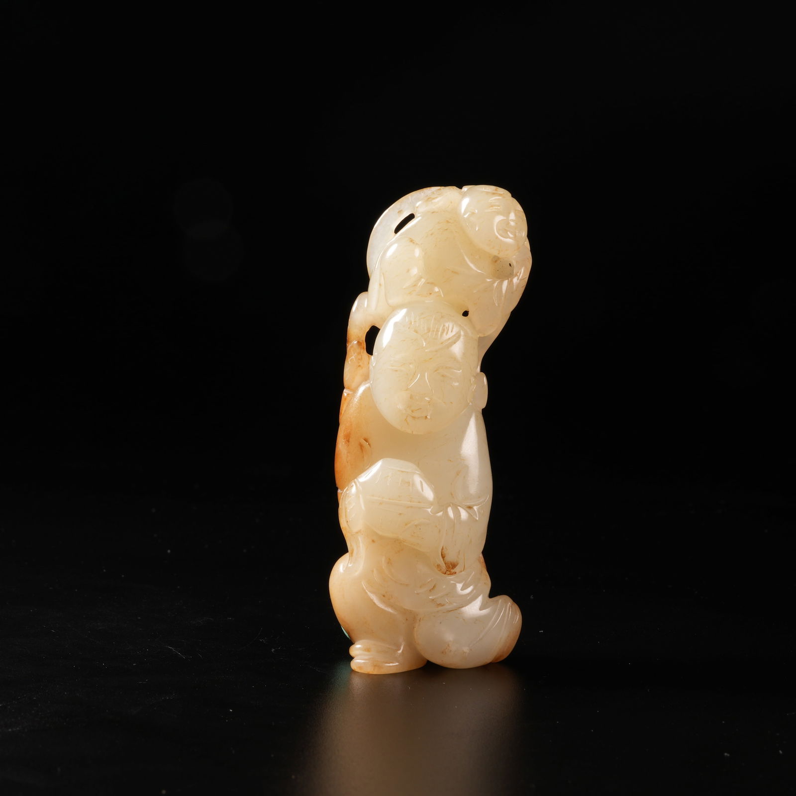 A HETIAN JADE HUMAN IMMORTAL PENDANT: Hetian Jade Human Immortal Pendant