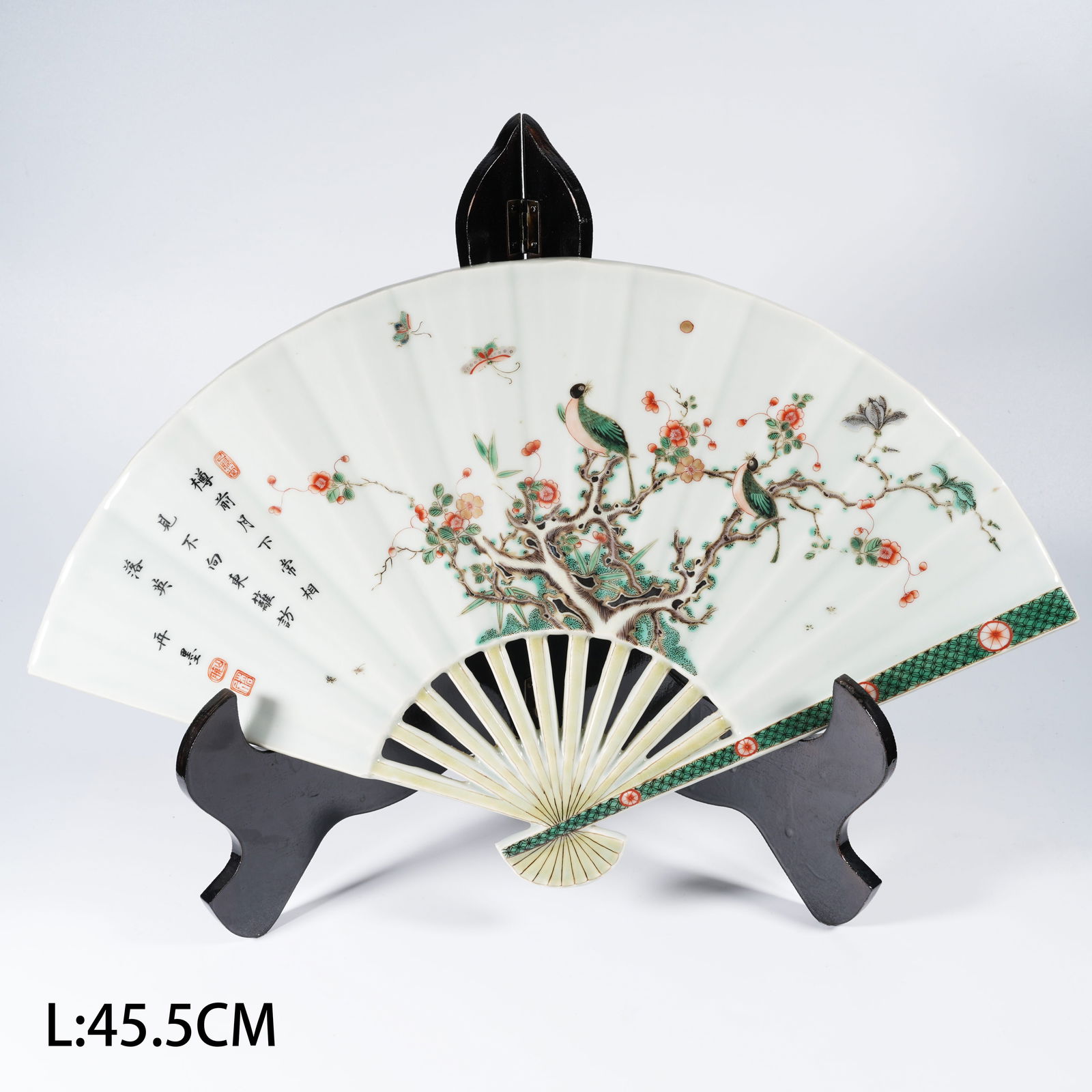 A PASTEL-COLORED FOLDING FAN WITH BIRD-AND-FLOWER MOTIFS: Pastel-colored folding fan with bird-and-flower motifs