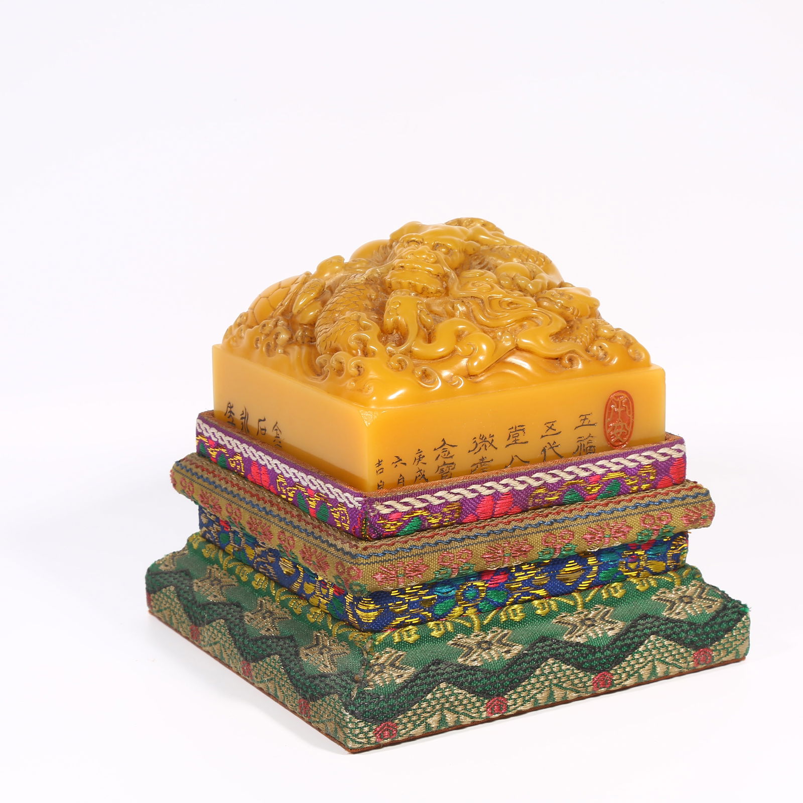 A SHOUSHAN TIANHUANG STONE SEAL WITH DRAGON-SHAPED KNOB: Shoushan Tianhuang stone seal with dragon-shaped knob