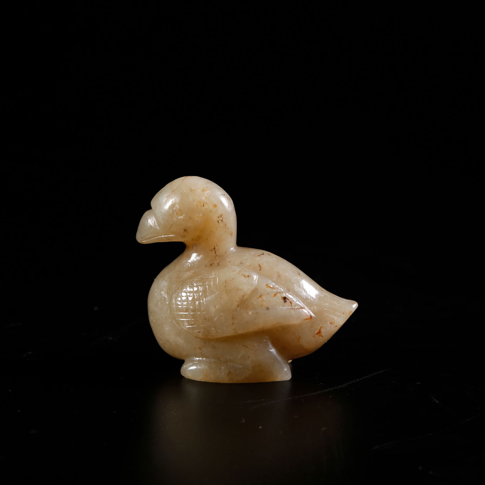 A HETIAN JADE DUCK-SHAPED ORNAMENT (1 of 6)