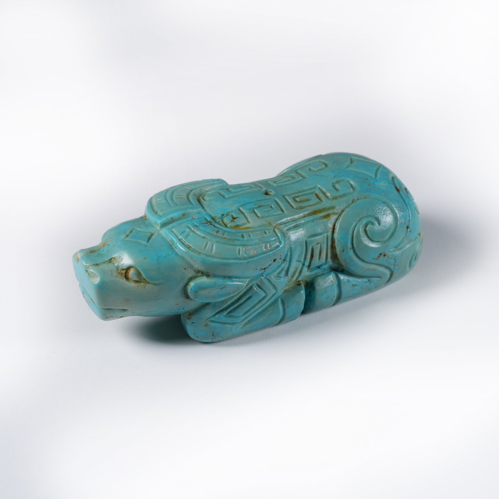 A TURQUOISE OX PENDANT: Turquoise ox pendant