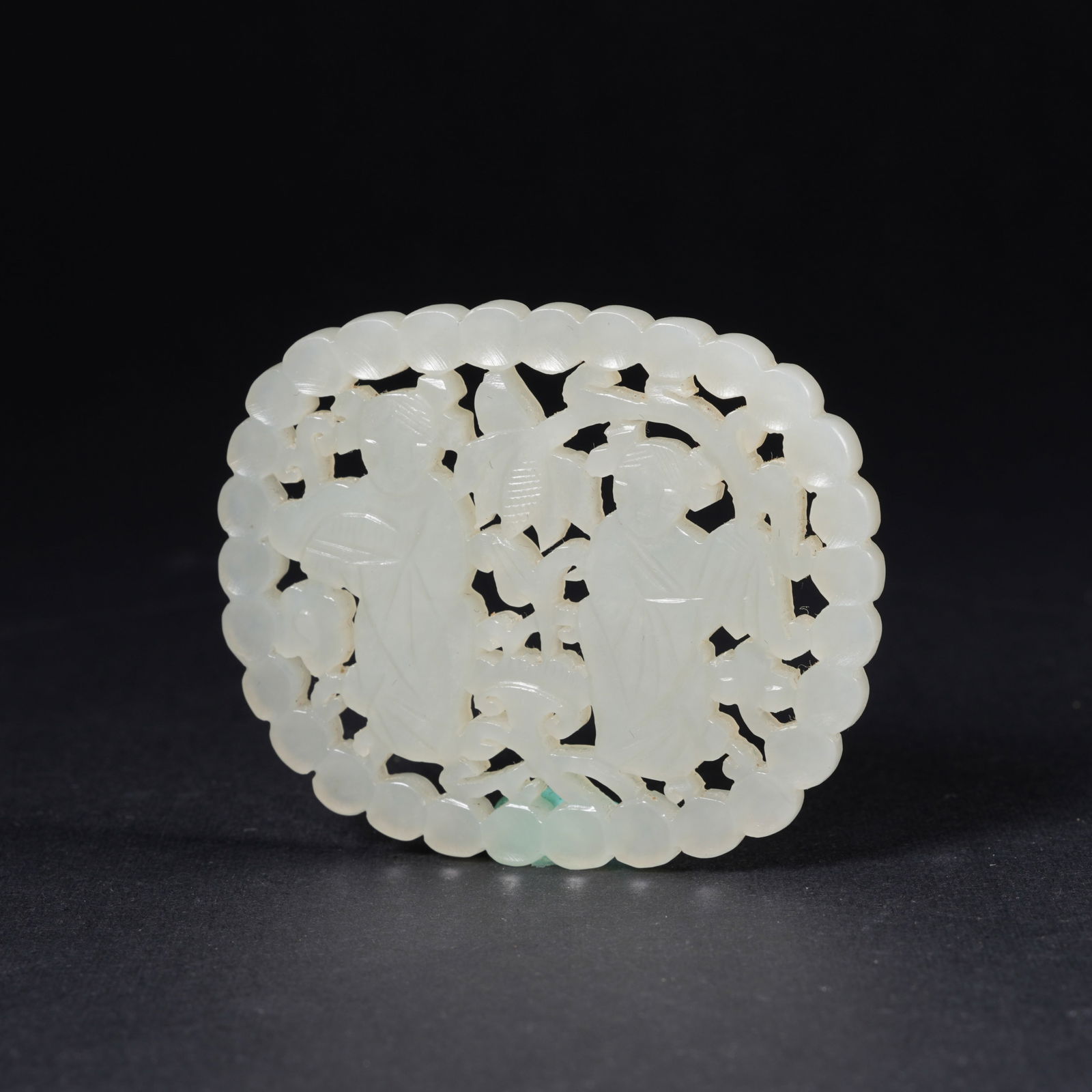 A HETIAN JADE FLORAL PLAQUE WITH BOY MOTIF: Hetian jade floral plaque with boy motif