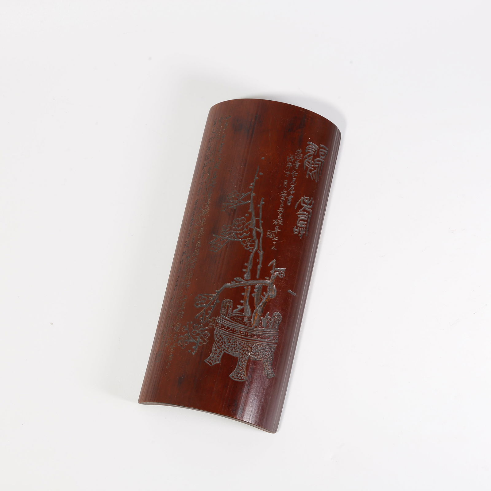 A BAMBOO-CARVED ARMREST WITH "PURE OFFERING" MOTIF: Bamboo-carved armrest with "pure offering" motif