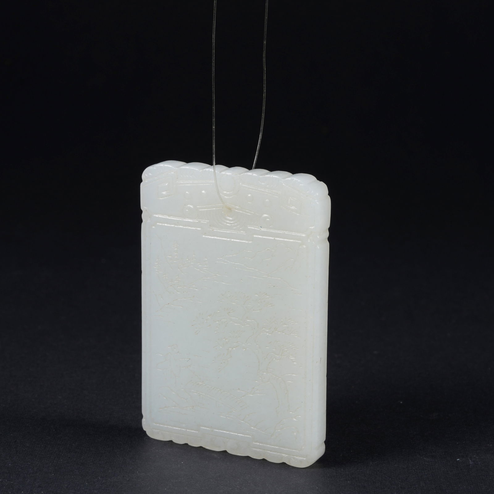 A HETIAN WHITE JADE PLAQUE WITH LANDSCAPE AND FIGURE MOTIF: Hetian white jade plaque with landscape and figure motif