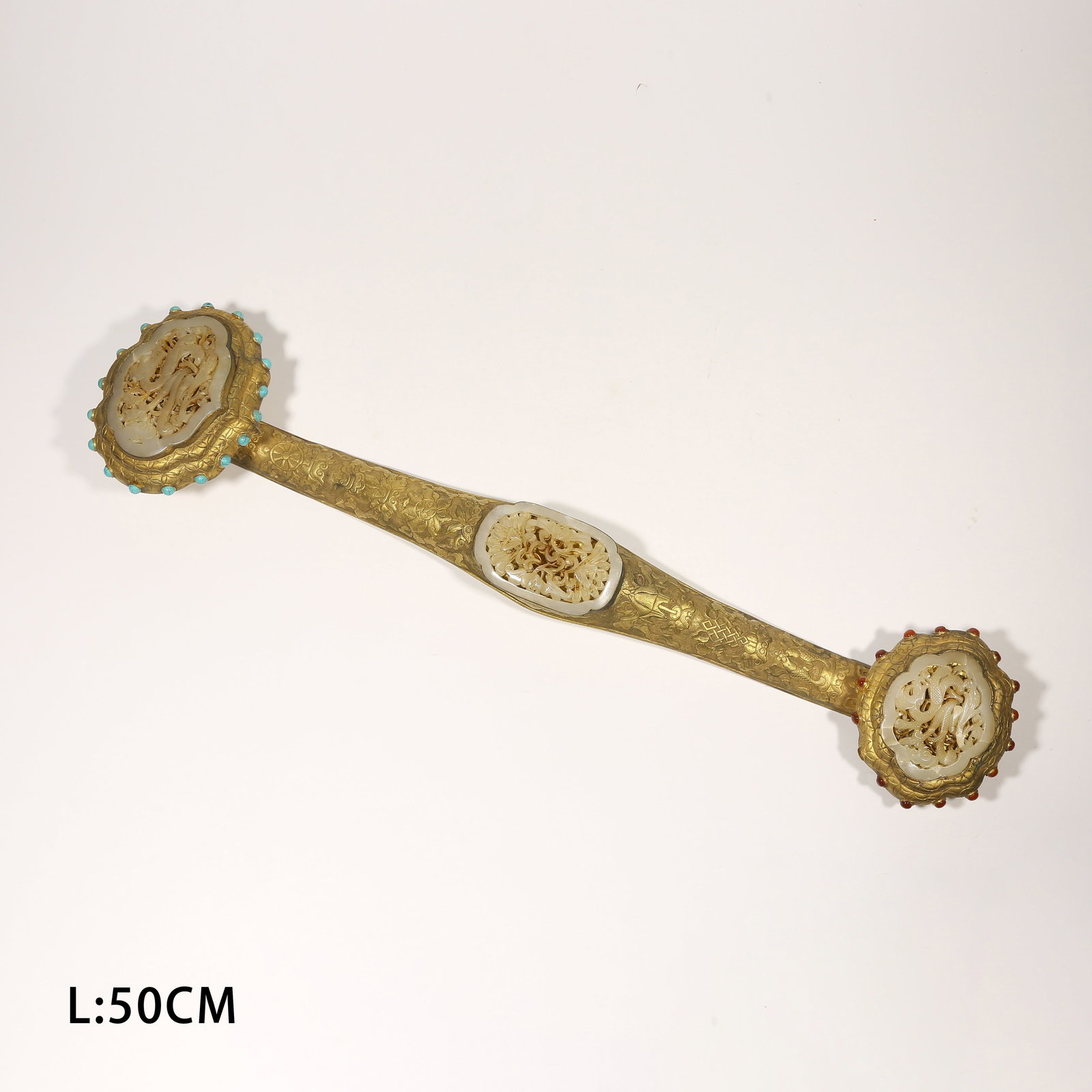 A GILDED BRONZE RUYI SCEPTER INLAID WITH GEMSTONES AND HETIAN JADE, FLORAL PATTERN: Gilded Bronze Ruyi Scepter Inlaid with Gemstones and Hetian Jade, Floral Pattern