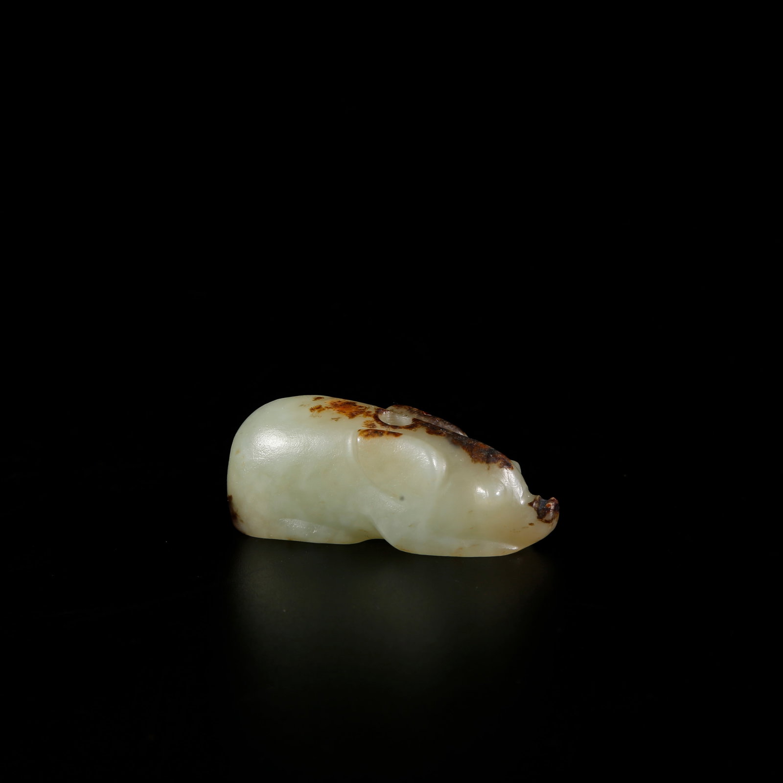 A HETIAN JADE PIG-SHAPED PENDANT: Hetian jade pig-shaped pendant