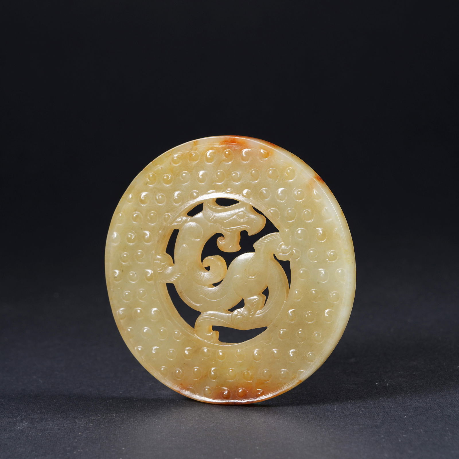 A ANCIENT JADE PENDANT WITH DRAGON MOTIF: Ancient jade pendant with dragon motif