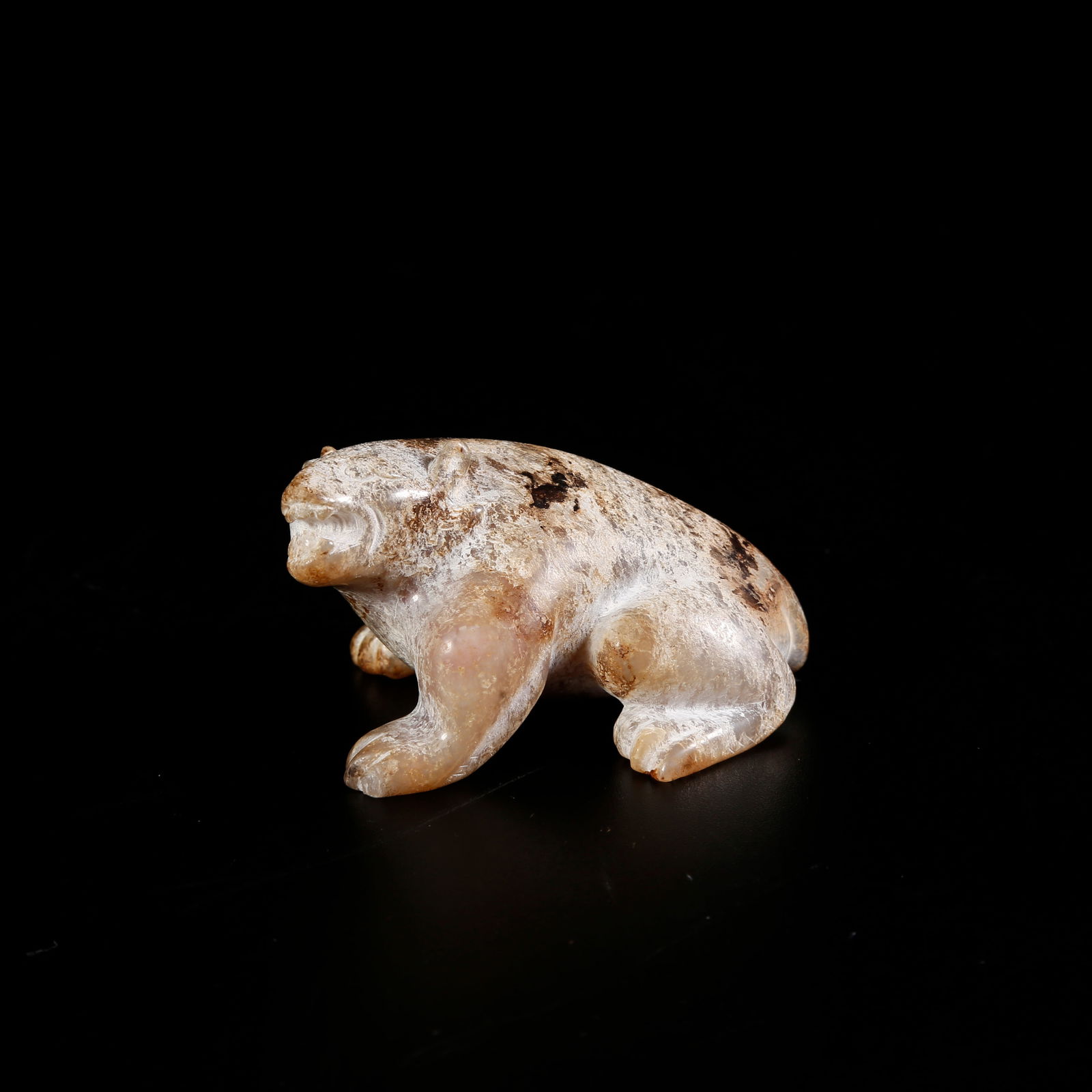 A HETIAN JADE BEAR-SHAPED ORNAMENT: Hetian jade bear-shaped ornament