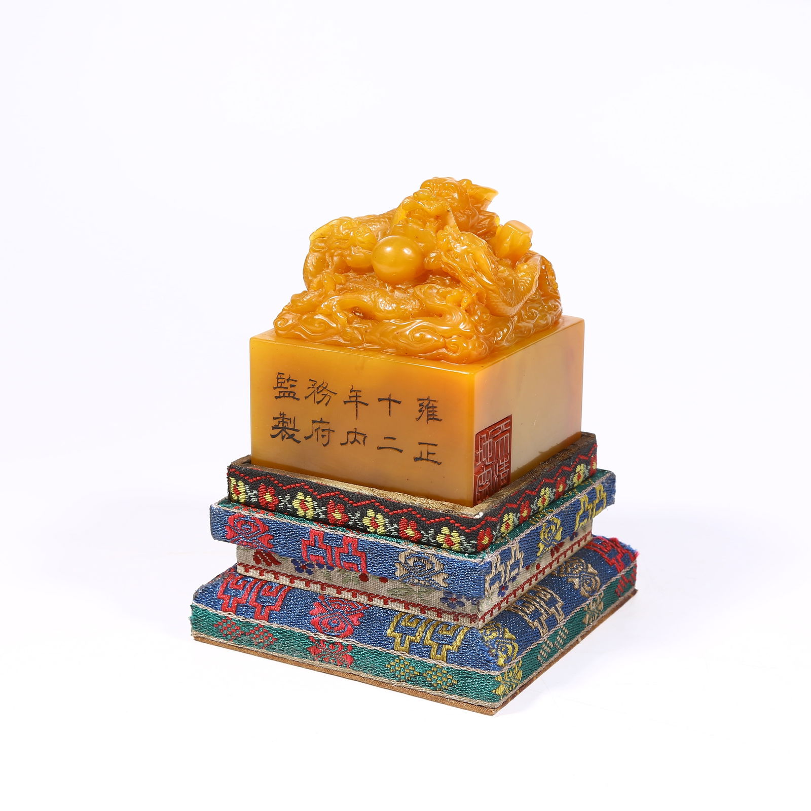 A SHOUSHAN TIANHUANG STONE SEAL WITH DRAGON KNOB: Shoushan Tianhuang stone seal with dragon knob