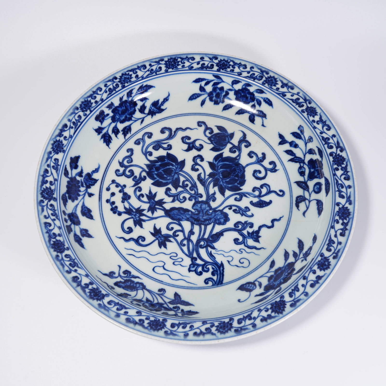 A BLUE-AND-WHITE FLOWER MOTIF PLATE (1 of 9)