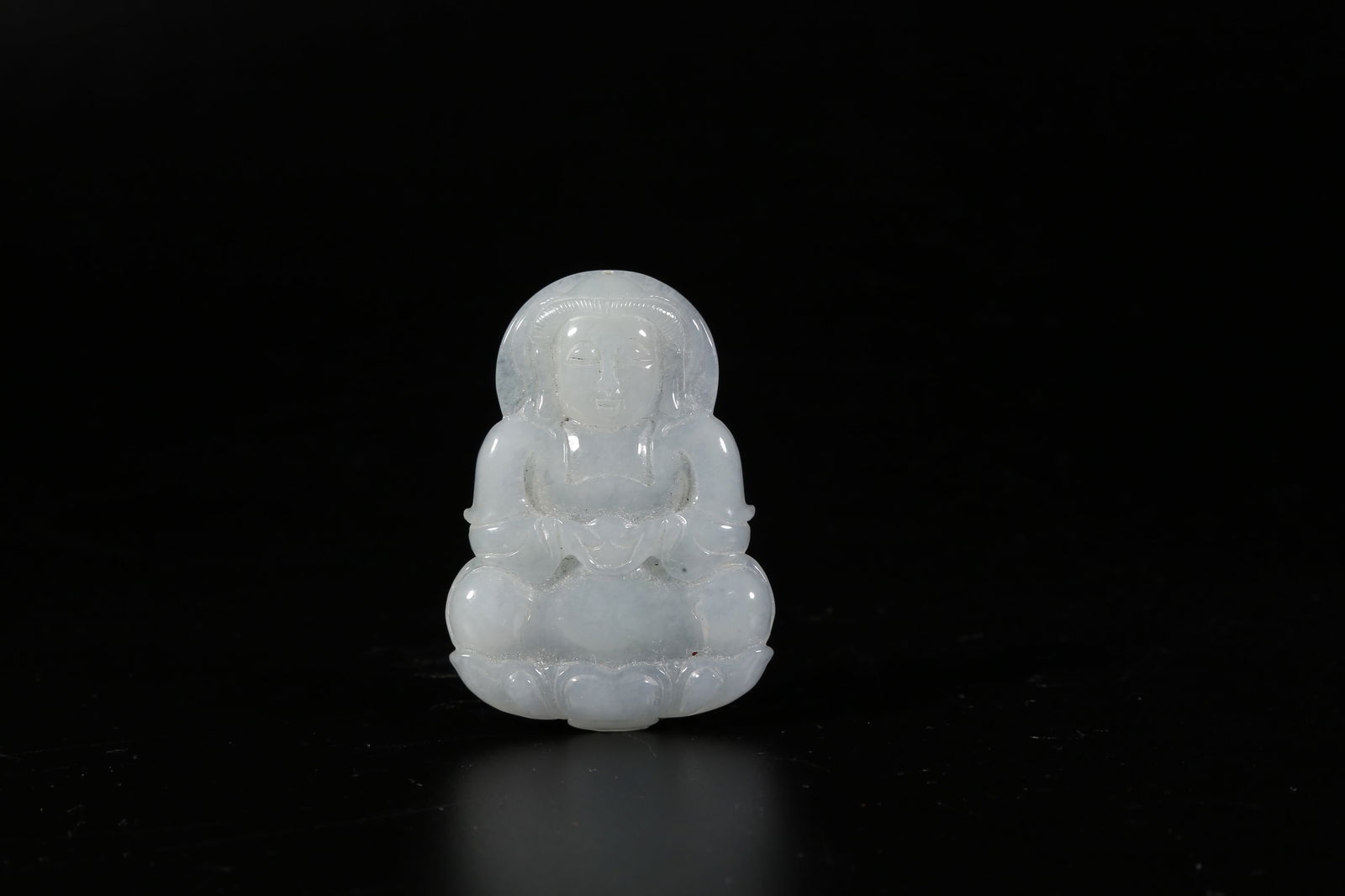 A JADEITE PENDANT WITH VAIROCANA BUDDHA MOTIF (1 of 8)