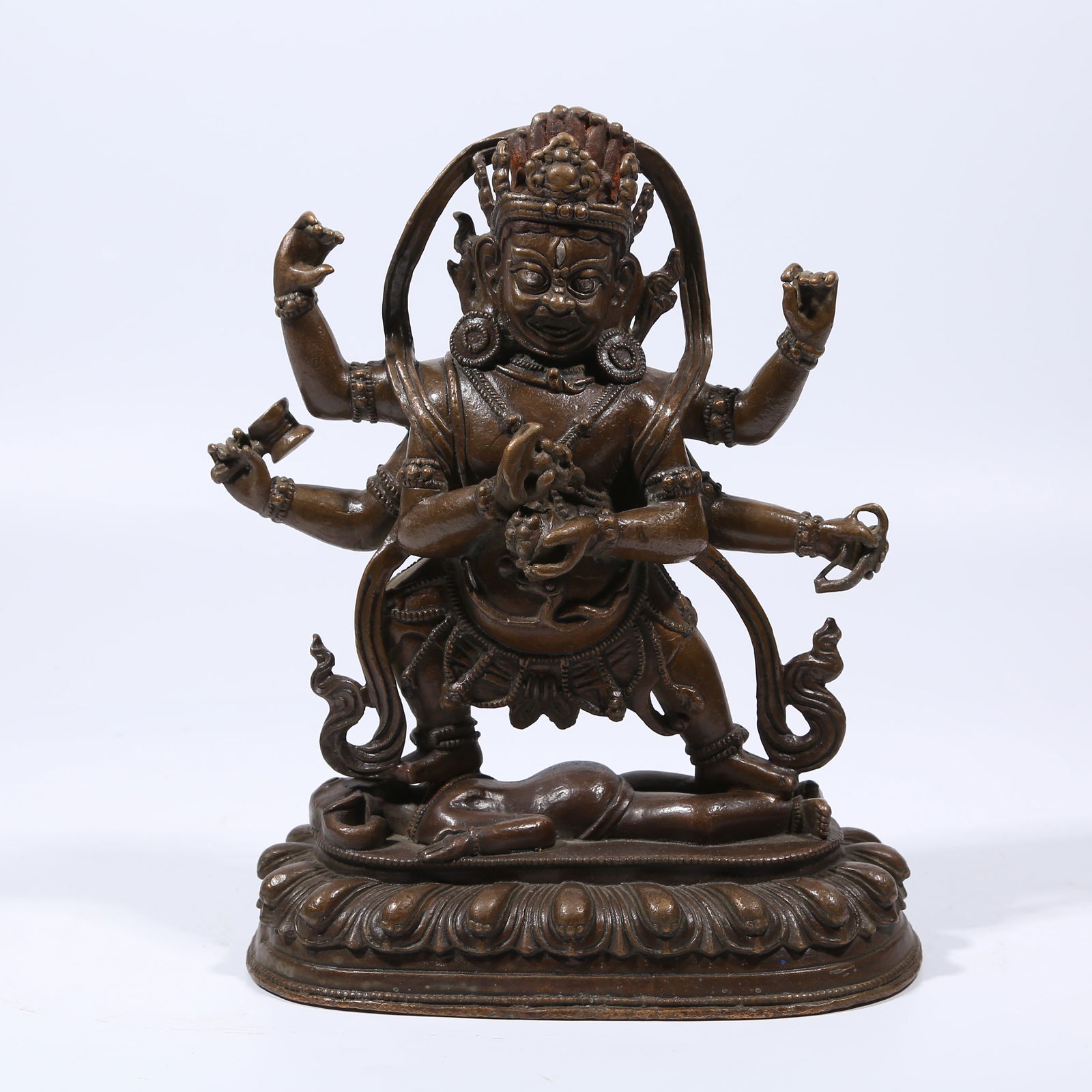 A ALLOY BRONZE SIX-ARMED MAHAKALA STATUE: Alloy Bronze Six-Armed Mahakala Statue