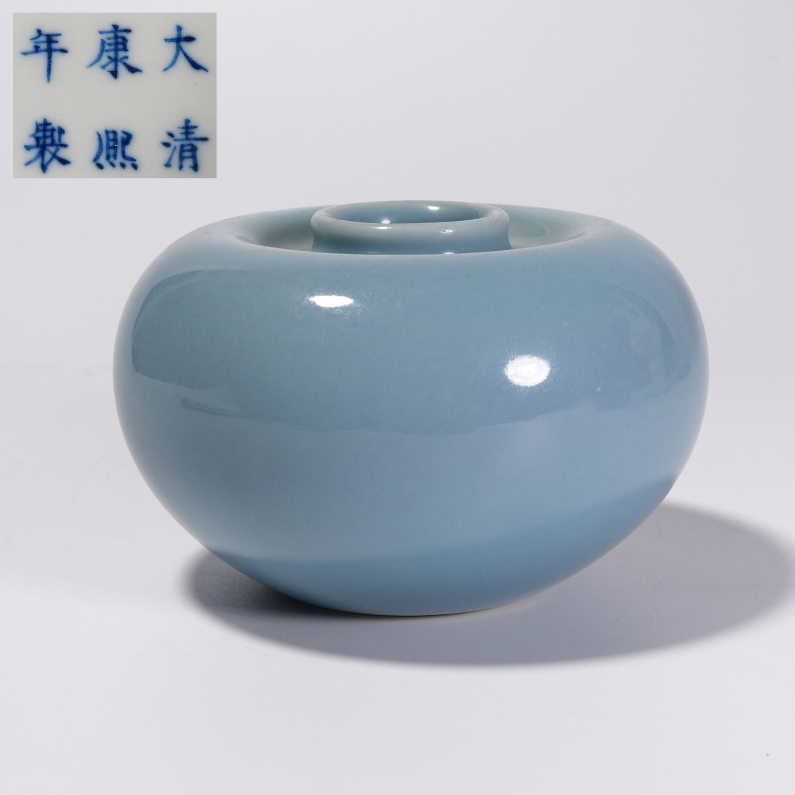 A BLUE-GLAZED APPLE-SHAPED VASE: Blue-Glazed Apple-Shaped Vase