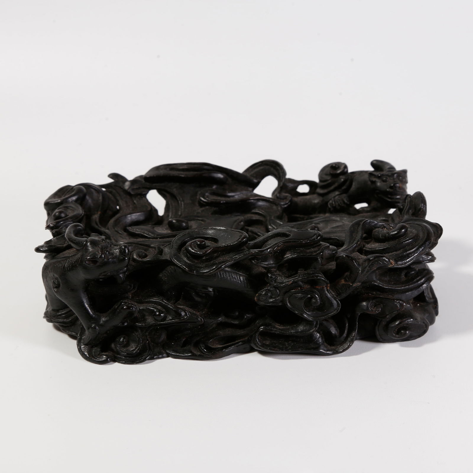 A ZITAN WOOD CARVED BASE: Zitan wood carved base