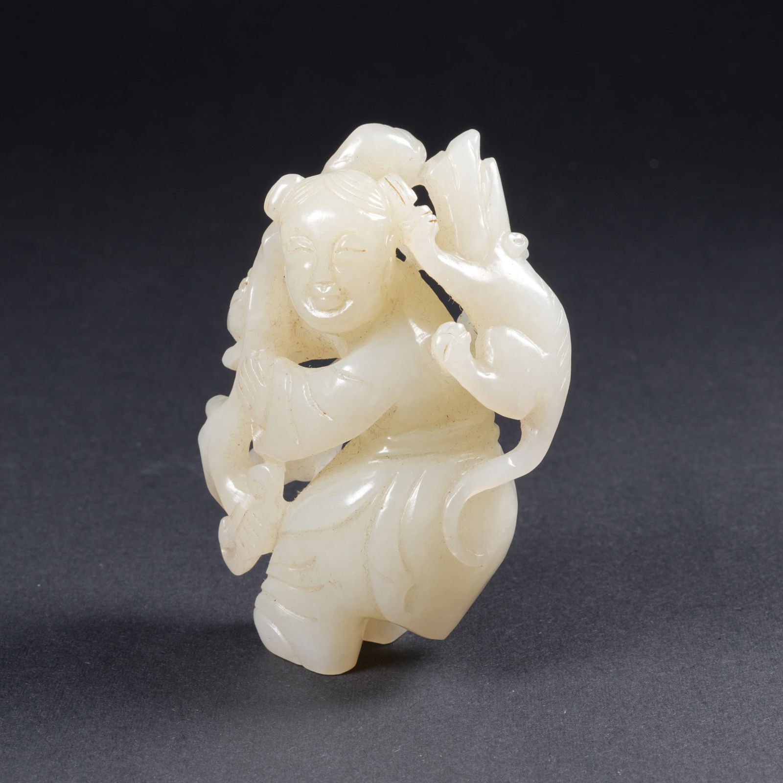 A HETIAN JADE BOY PENDANT: Hetian jade boy pendant