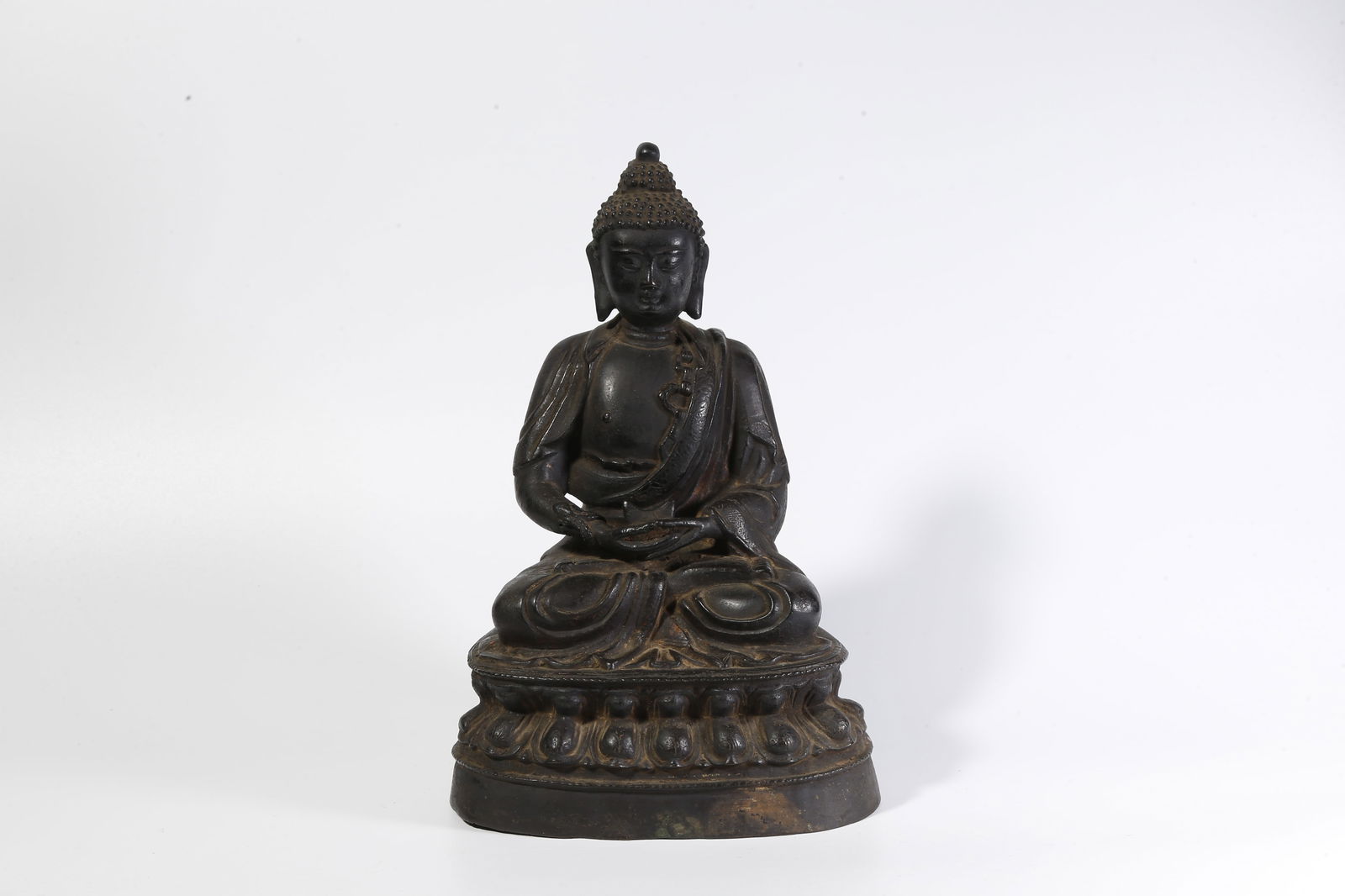 A BRONZE SHAKYAMUNI BUDDHA STATUE (1 of 9)