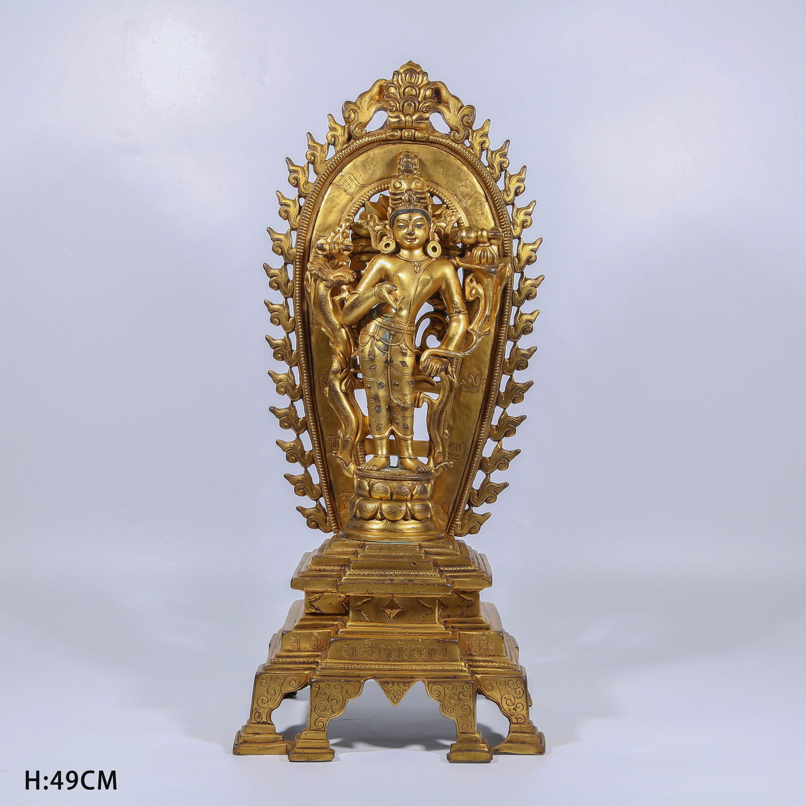 A GILT BRONZE LOTUS-HAND AVALOKITESHVARA STANDING STATUE (1 of 8)