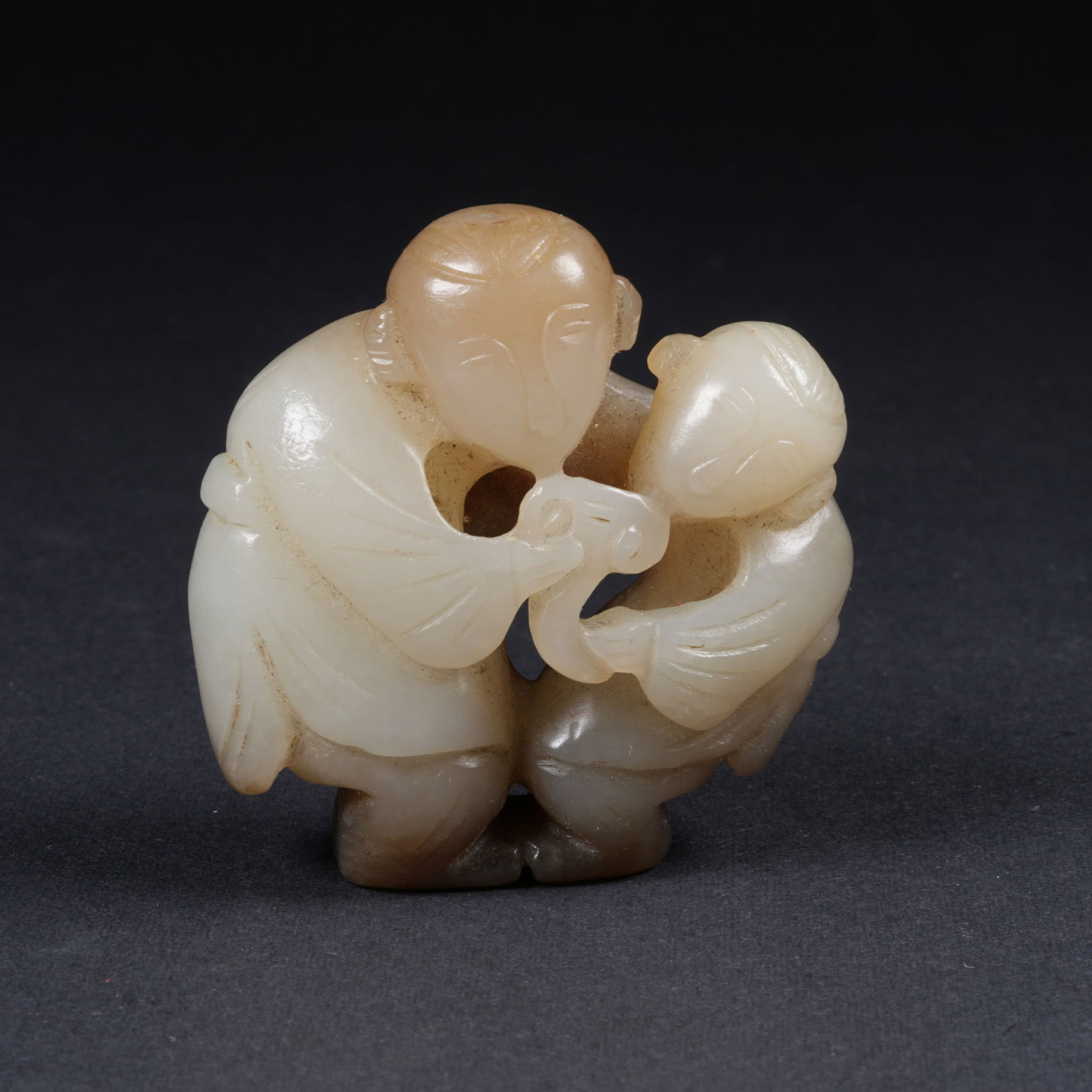 A HETIAN JADE FIGURE PENDANT: Hetian jade figure pendant