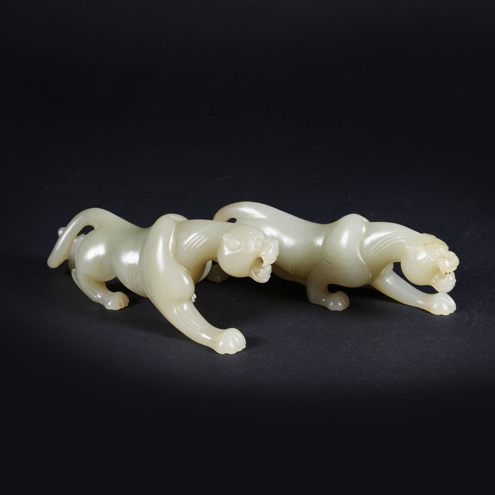 A SET OF MIDDLE-PERIOD JADE MYTHICAL-BEAST ORNAMENTS: Set of Middle-period jade mythical-beast ornaments