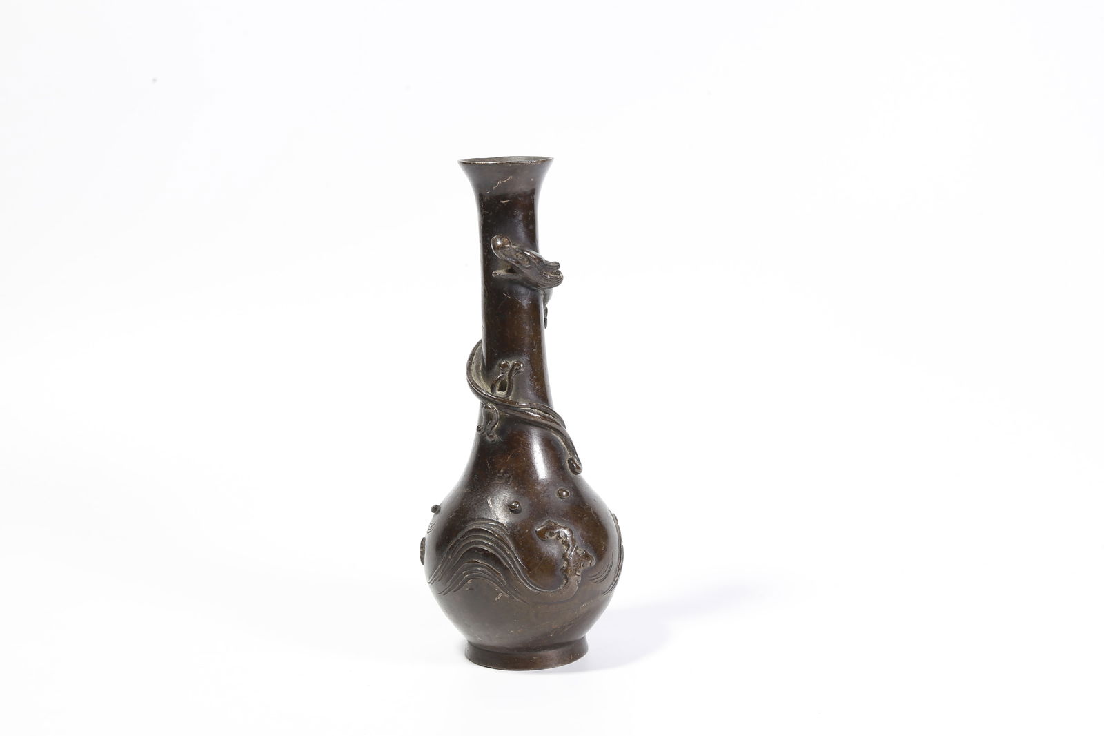 A BRONZE VASE WITH COILED-DRAGON MOTIF: Bronze vase with coiled-dragon motif