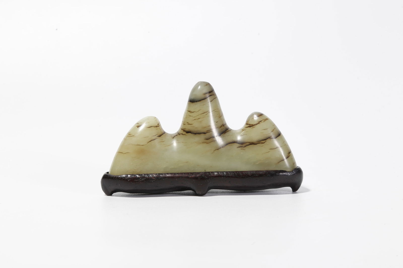 A HETIAN JADE MINIATURE LANDSCAPE BRUSH RACK: Hetian jade miniature landscape brush rack