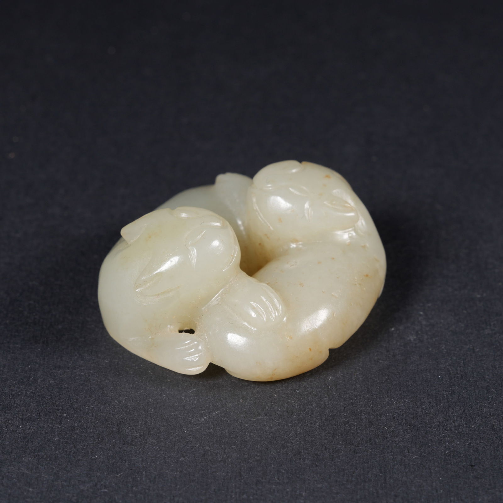 A HETIAN JADE MYTHICAL-BEAST PENDANT (1 of 7)