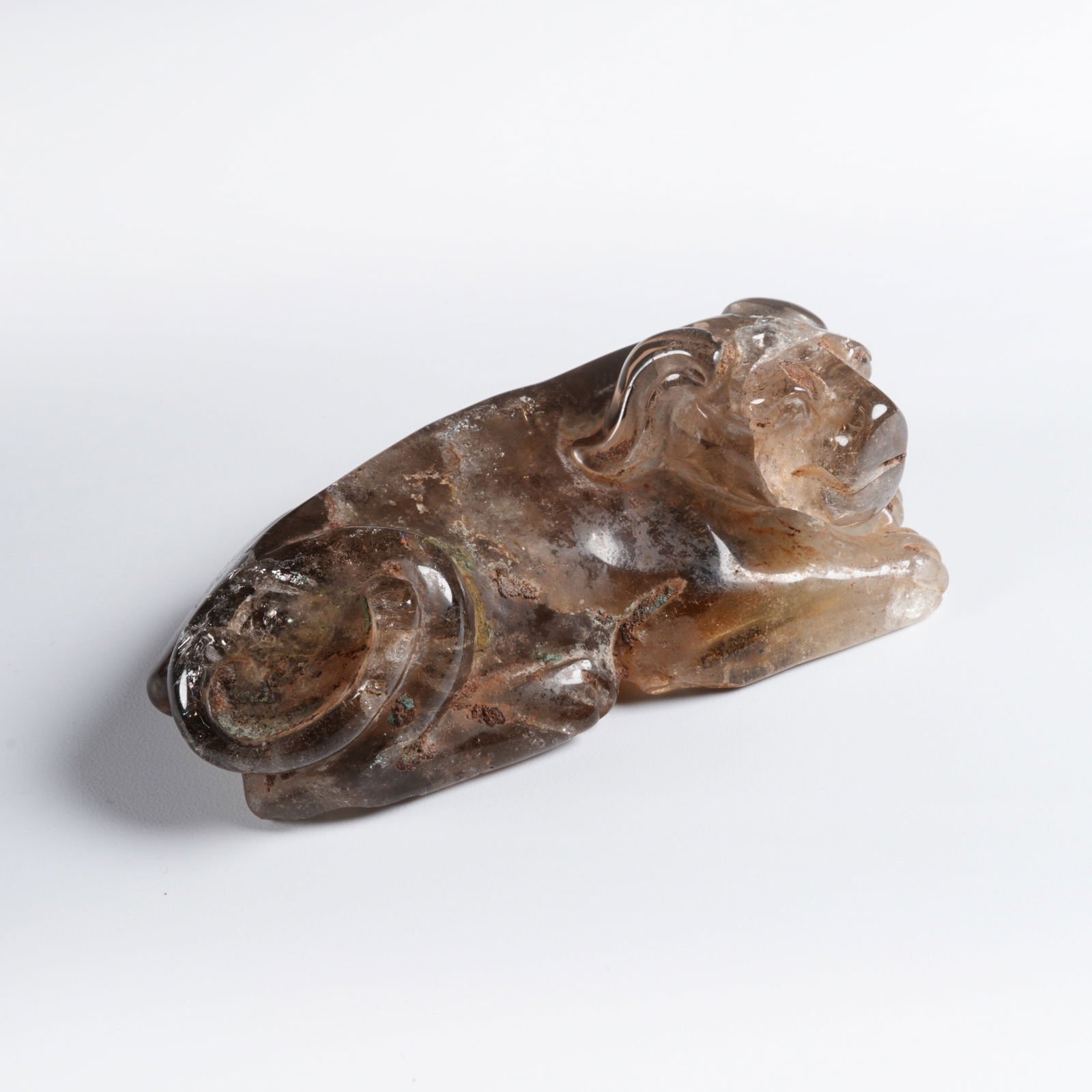 A CRYSTAL MYTHICAL-BEAST PAPERWEIGHT: Crystal mythical-beast paperweight