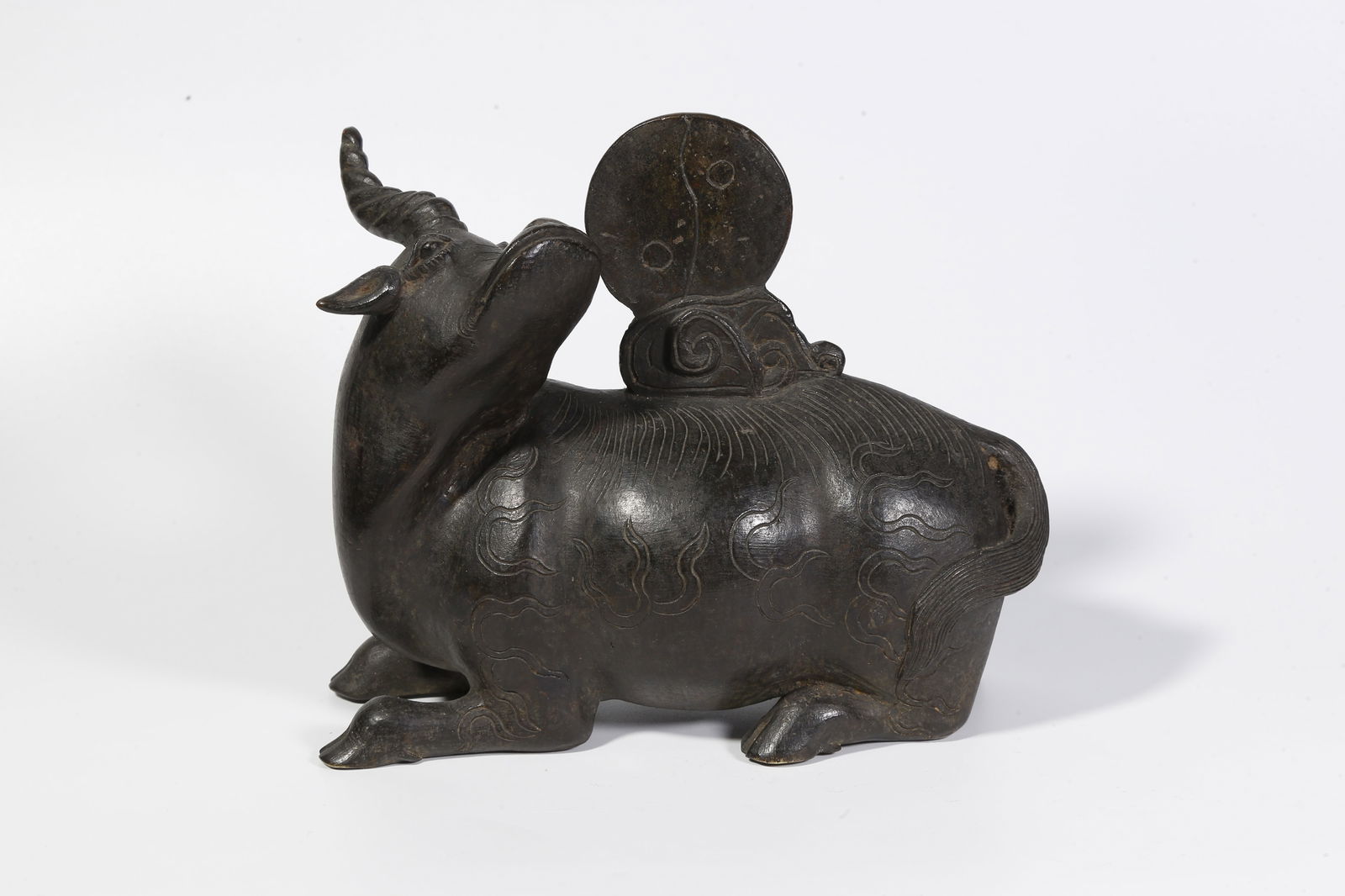 A BRONZE ORNAMENT: Bronze ornament