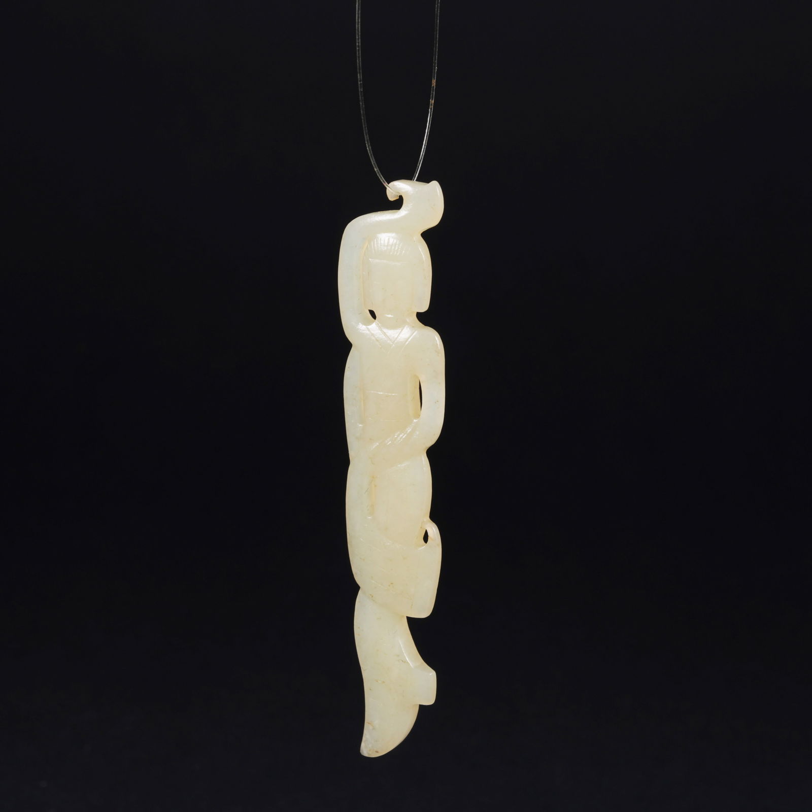 A HETIAN JADE FIGURE PENDANT: Hetian jade figure pendant
