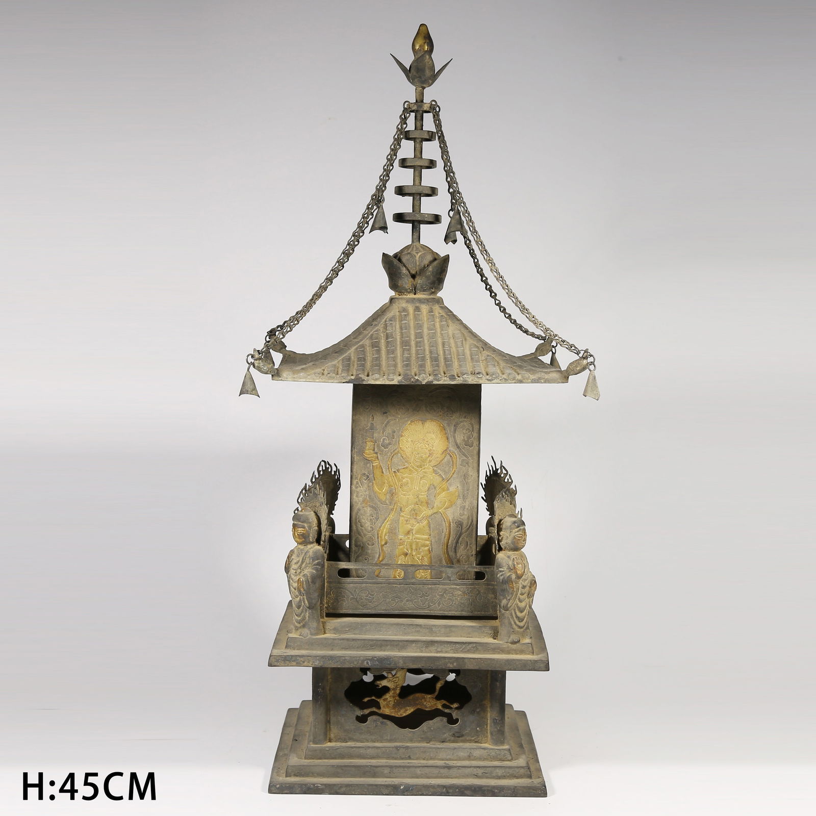 A SILVER PARTIAL GILDED FOUR HEAVENLY KINGS PAGODA: Silver Partial Gilded Four Heavenly Kings Pagoda