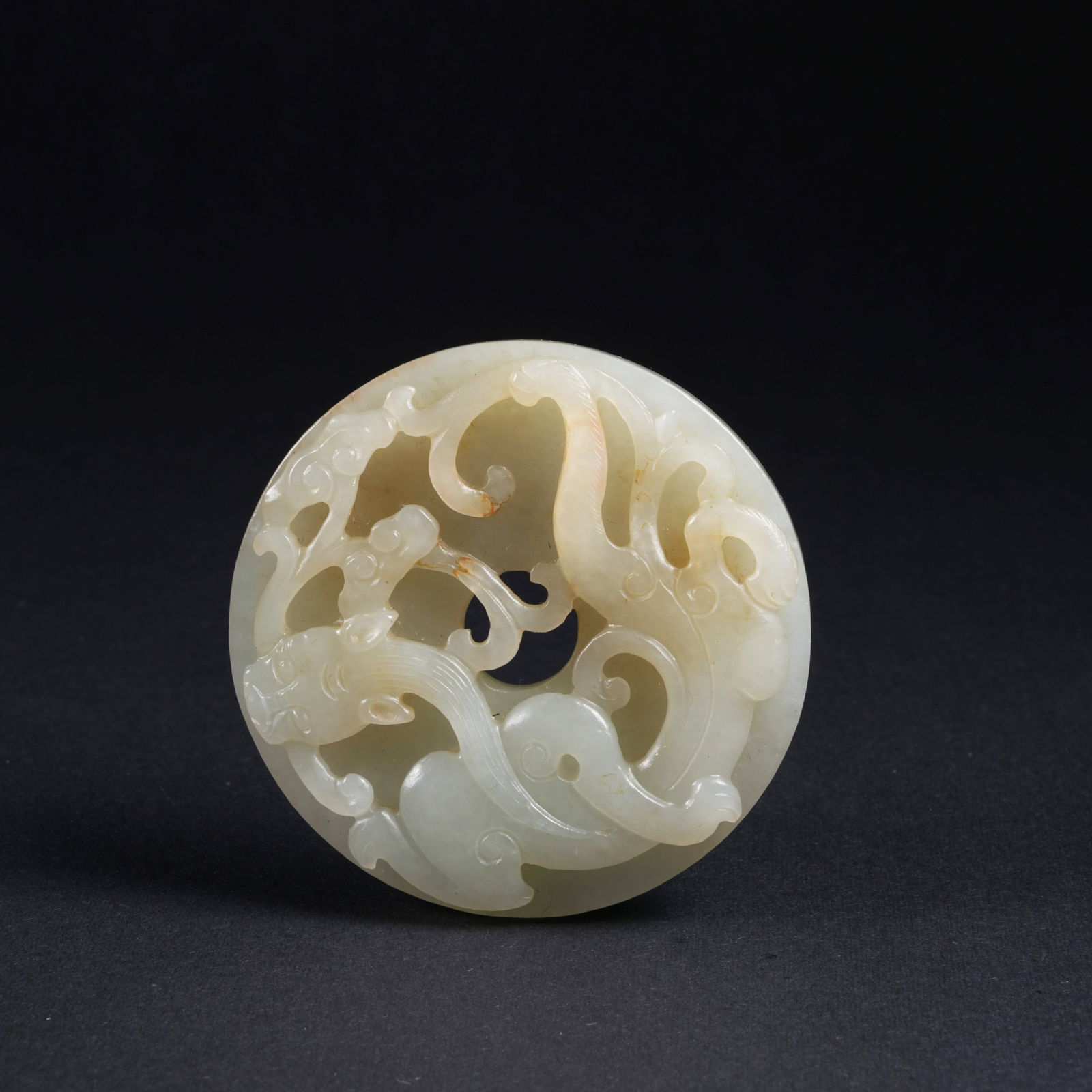 A HETIAN JADE BI DISC WITH CHI DRAGON MOTIF (1 of 7)