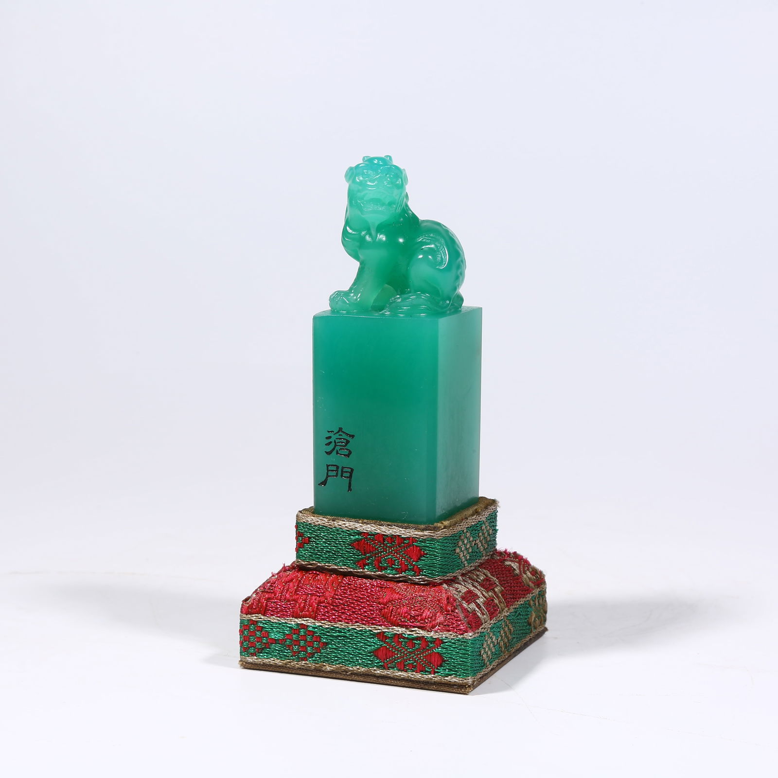 A SHOUSHAN AIYE GREEN STONE SEAL WITH BEAST KNOB: Shoushan Aiye Green stone seal with beast knob