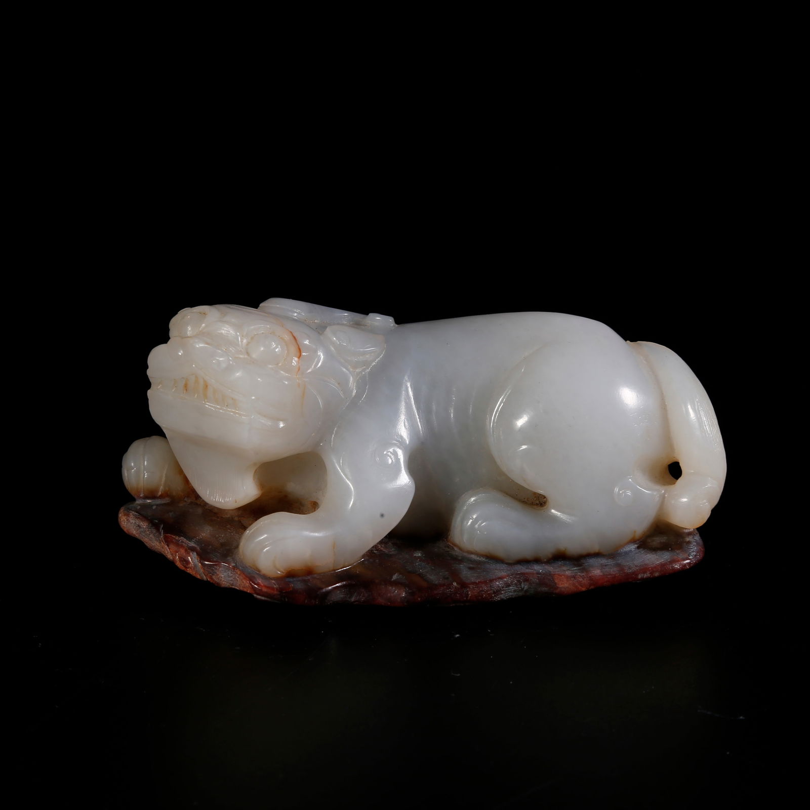 A HETIAN JADE TIGER-SHAPED ORNAMENT (1 of 8)