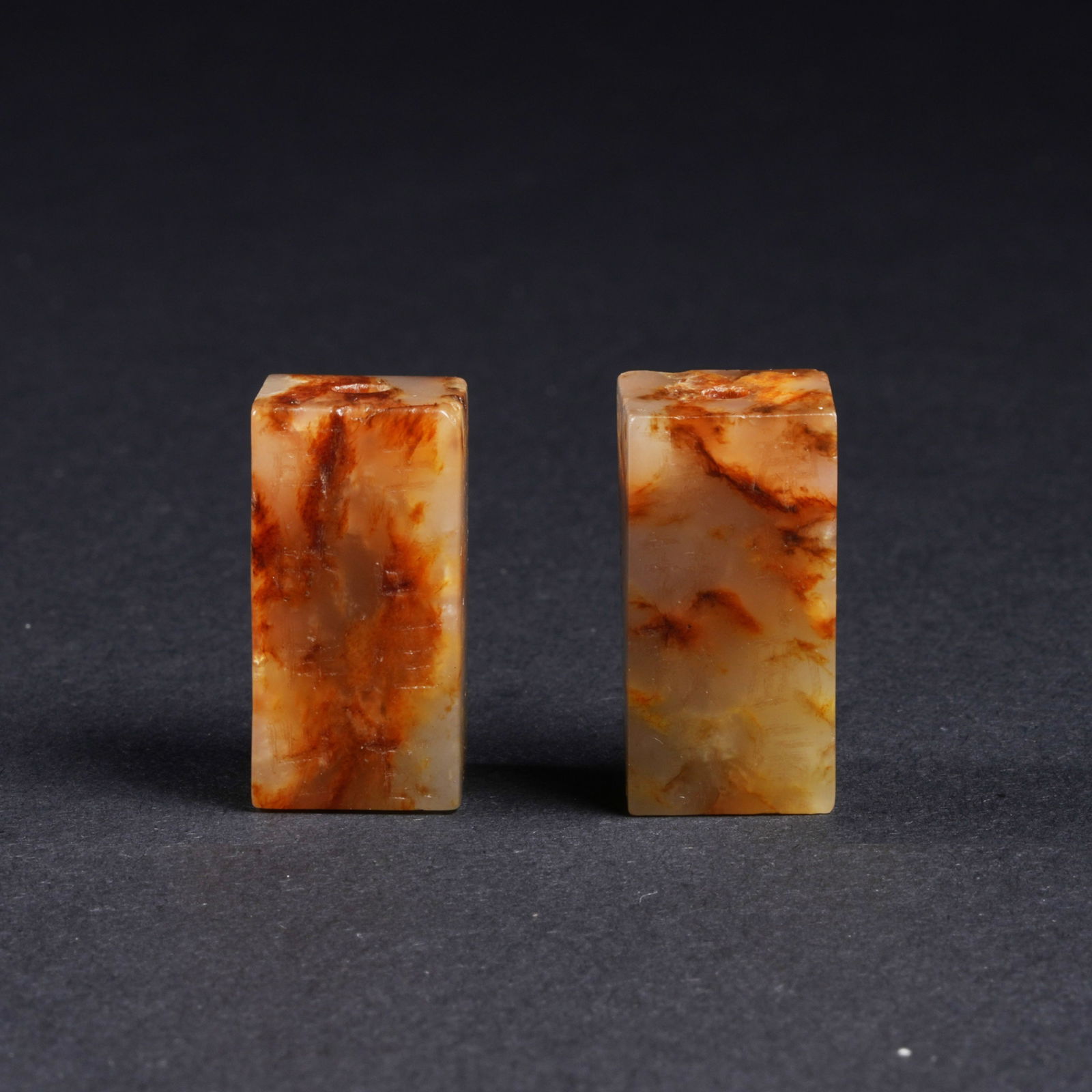 A SET OF ANCIENT JADE POETIC-INSCRIPTION TOGGLES: Set of ancient jade poetic-inscription toggles