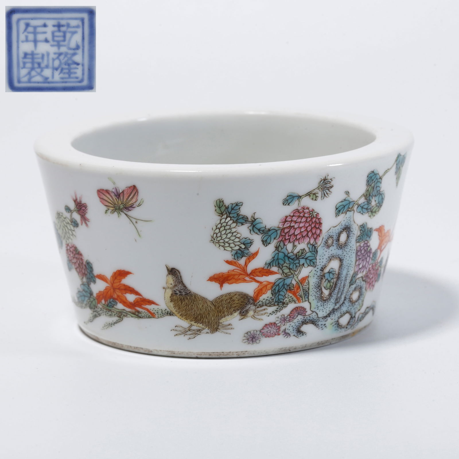 A FAMILLE ROSE CONCH-SHAPED FLORAL BRUSH WASHER: Famille rose conch-shaped floral brush washer