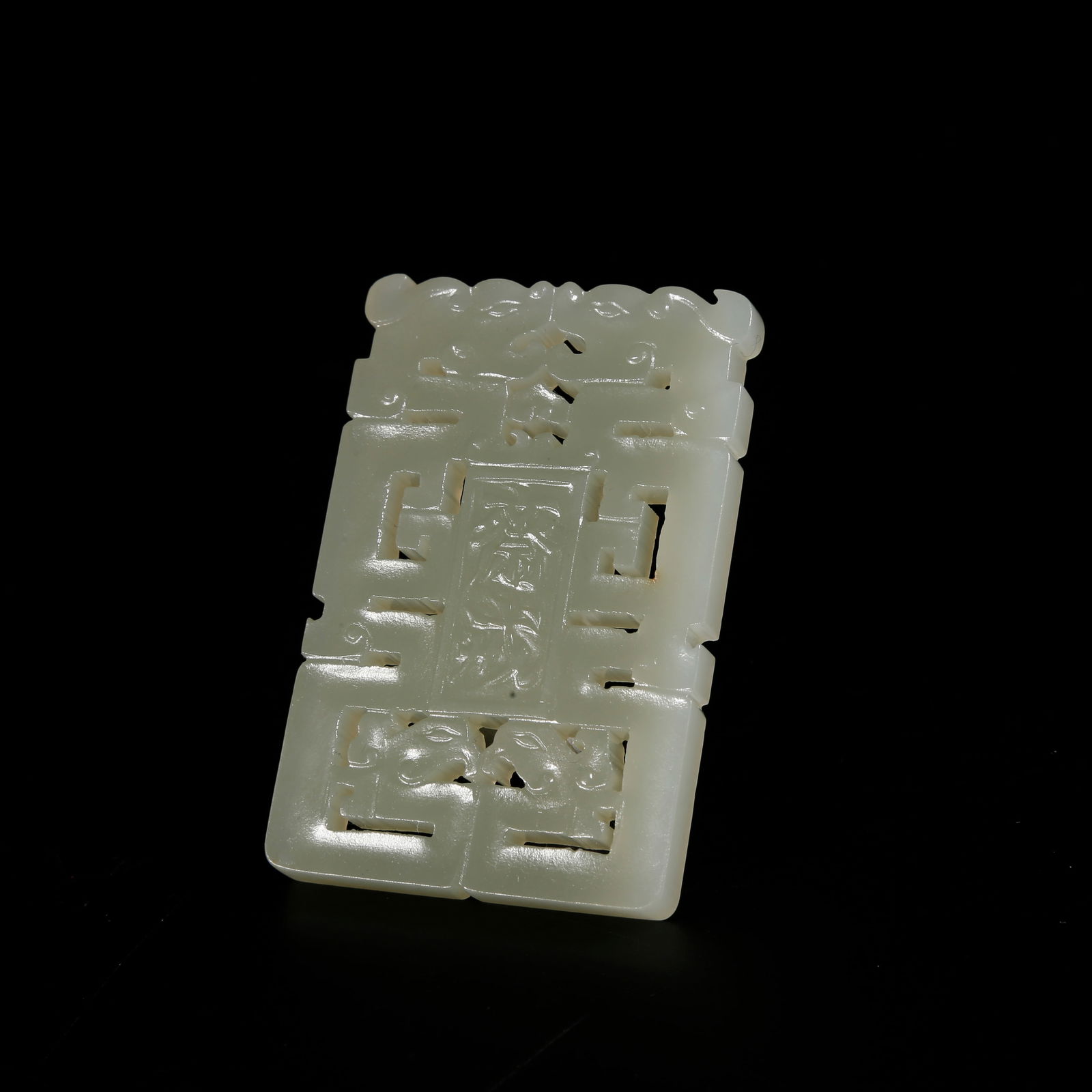 A HETIAN JADE FASTING PLAQUE (1 of 10)