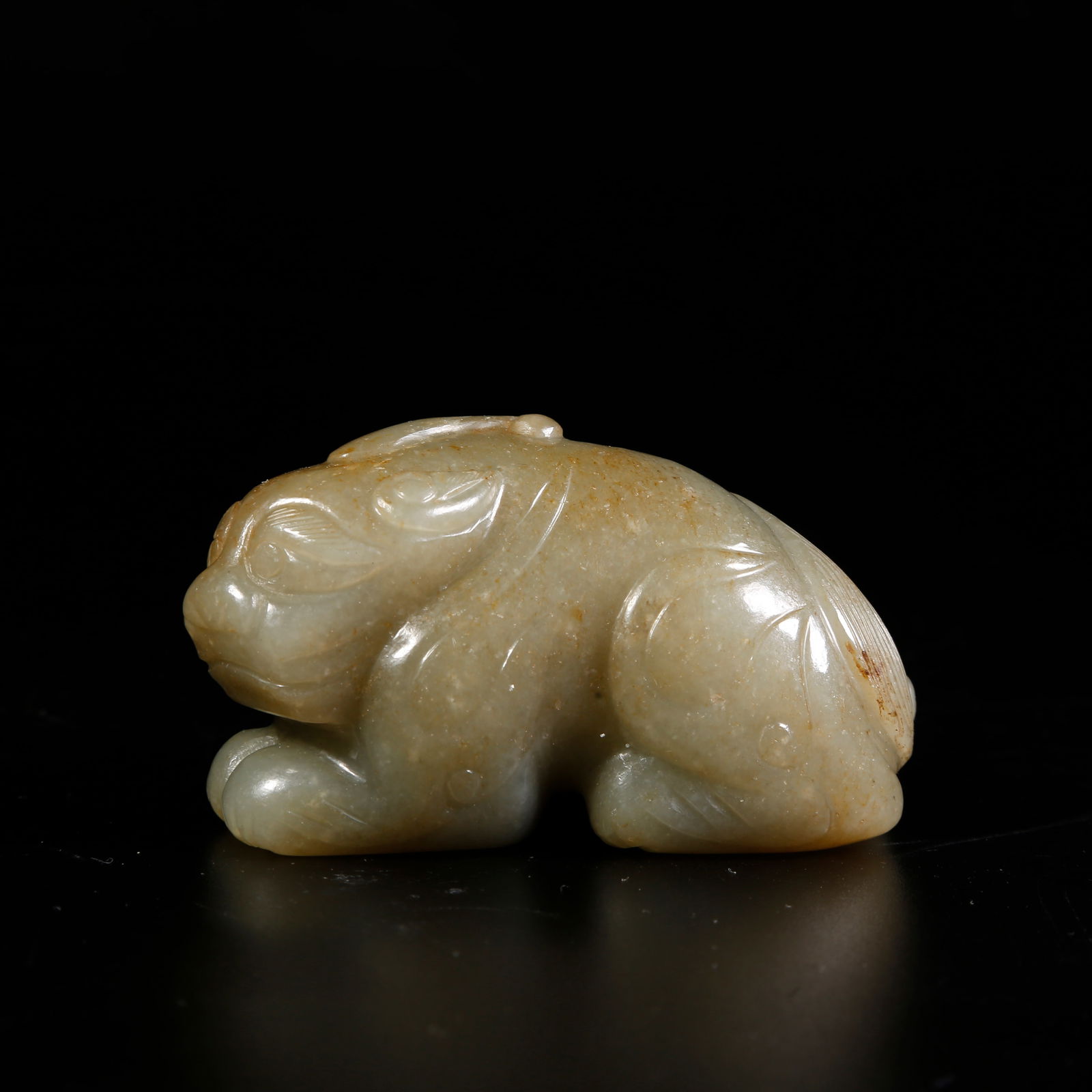 A HETIAN JADE BEAST-SHAPED ORNAMENT (1 of 9)