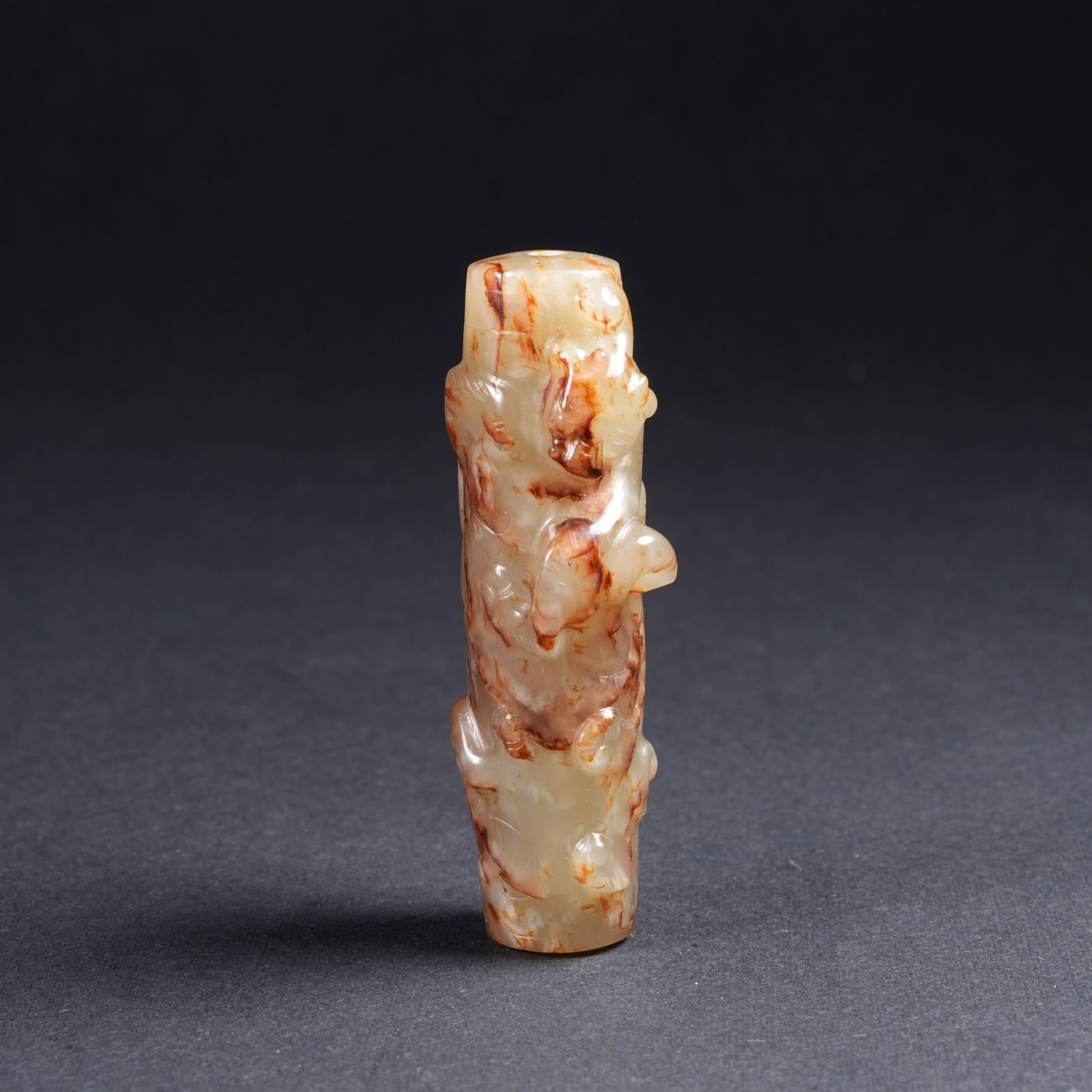 A ANCIENT JADE PENDANT WITH CHI DRAGON MOTIF: Ancient jade pendant with chi dragon motif