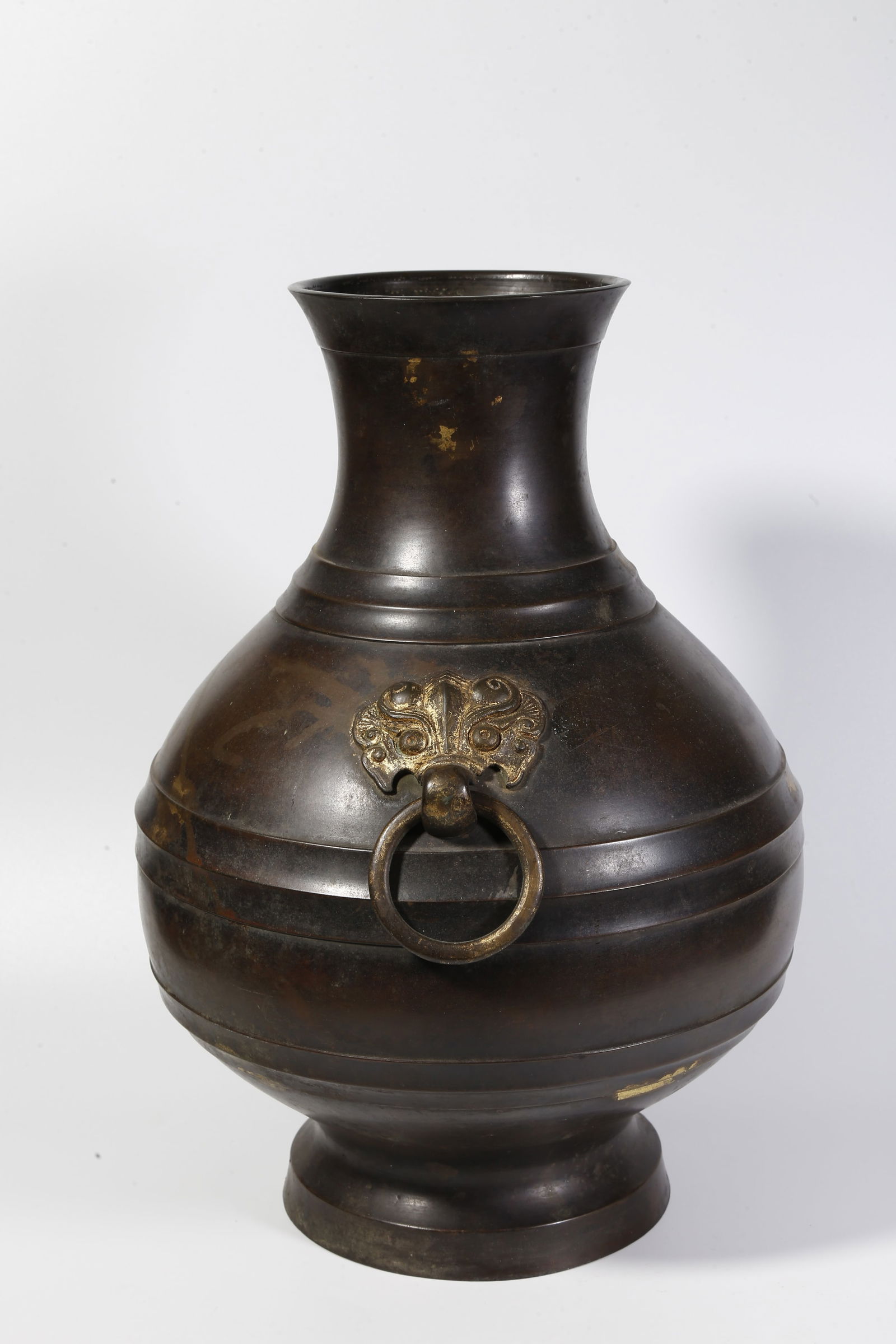 A BRONZE DOUBLE-RING-HANDLED BOTTLE - 8