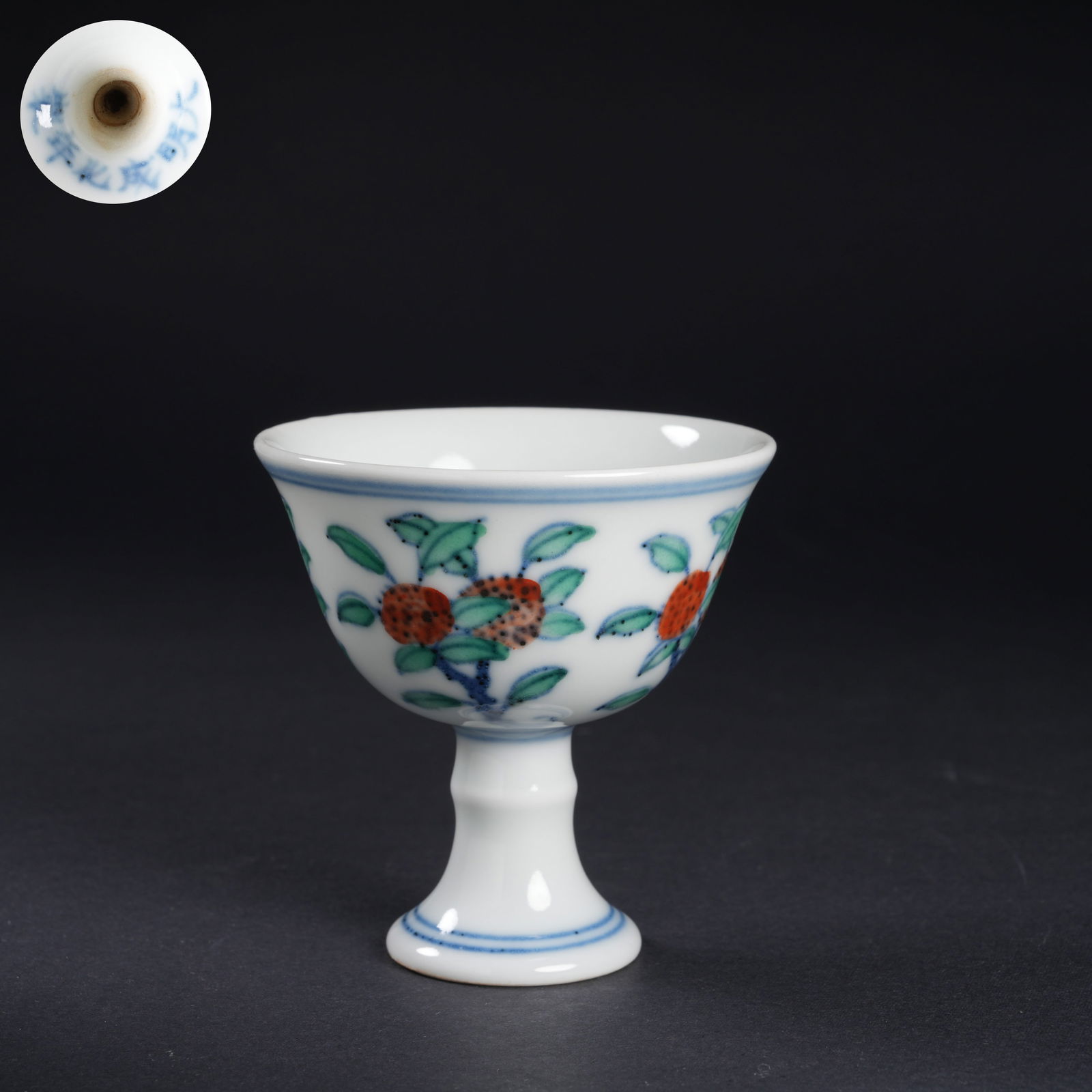 A DOUCAI FLORAL HIGH-FOOTED CUP: Doucai floral high-footed cup
