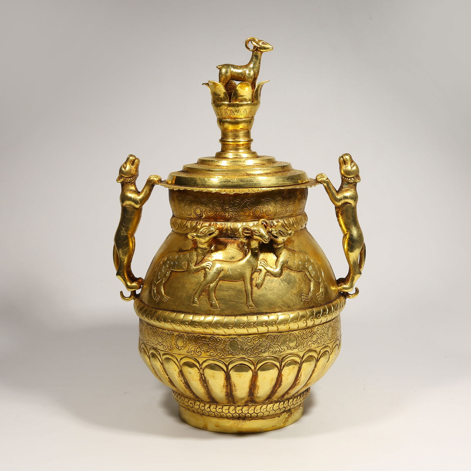 A GILDED BRONZE COVERED JAR WITH BEAST KNOB: Gilded Bronze Covered Jar with Beast Knob