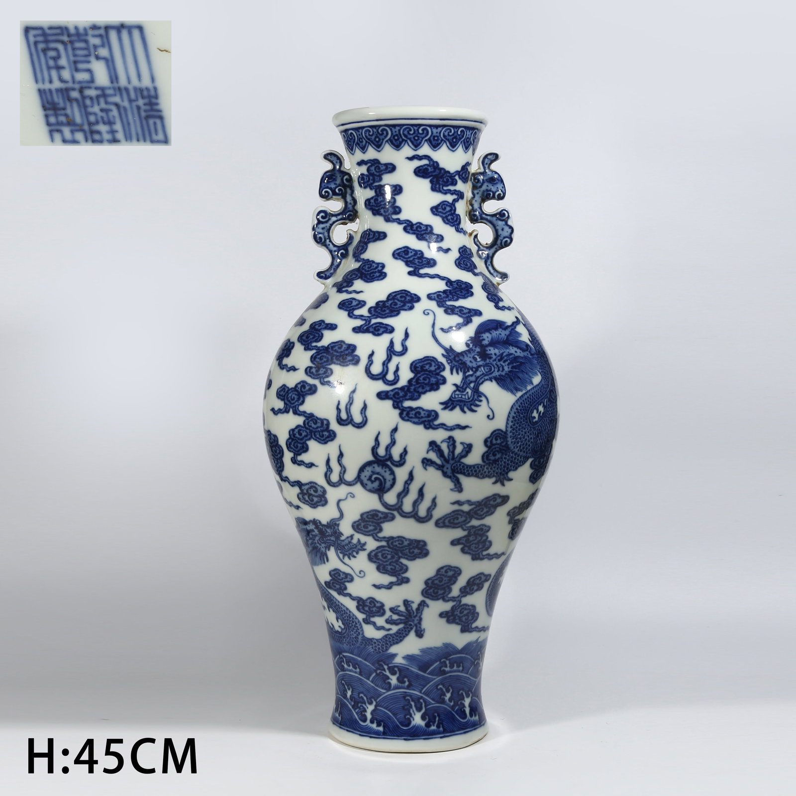 A BLUE AND WHITE PHOENIX-HANDLED VASE WITH DRAGON TEACHING SON MOTIF: Blue and white phoenix-handled vase with dragon teaching son motif