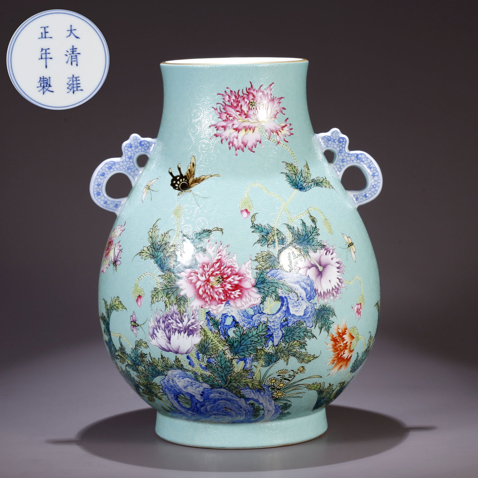 A TURQUOISE-GREEN GLAZED DOUBLE-HANDLED ZUN WITH FLORAL DISH PATTERN: Turquoise-Green Glazed Double-Handled Zun with Floral Dish Pattern