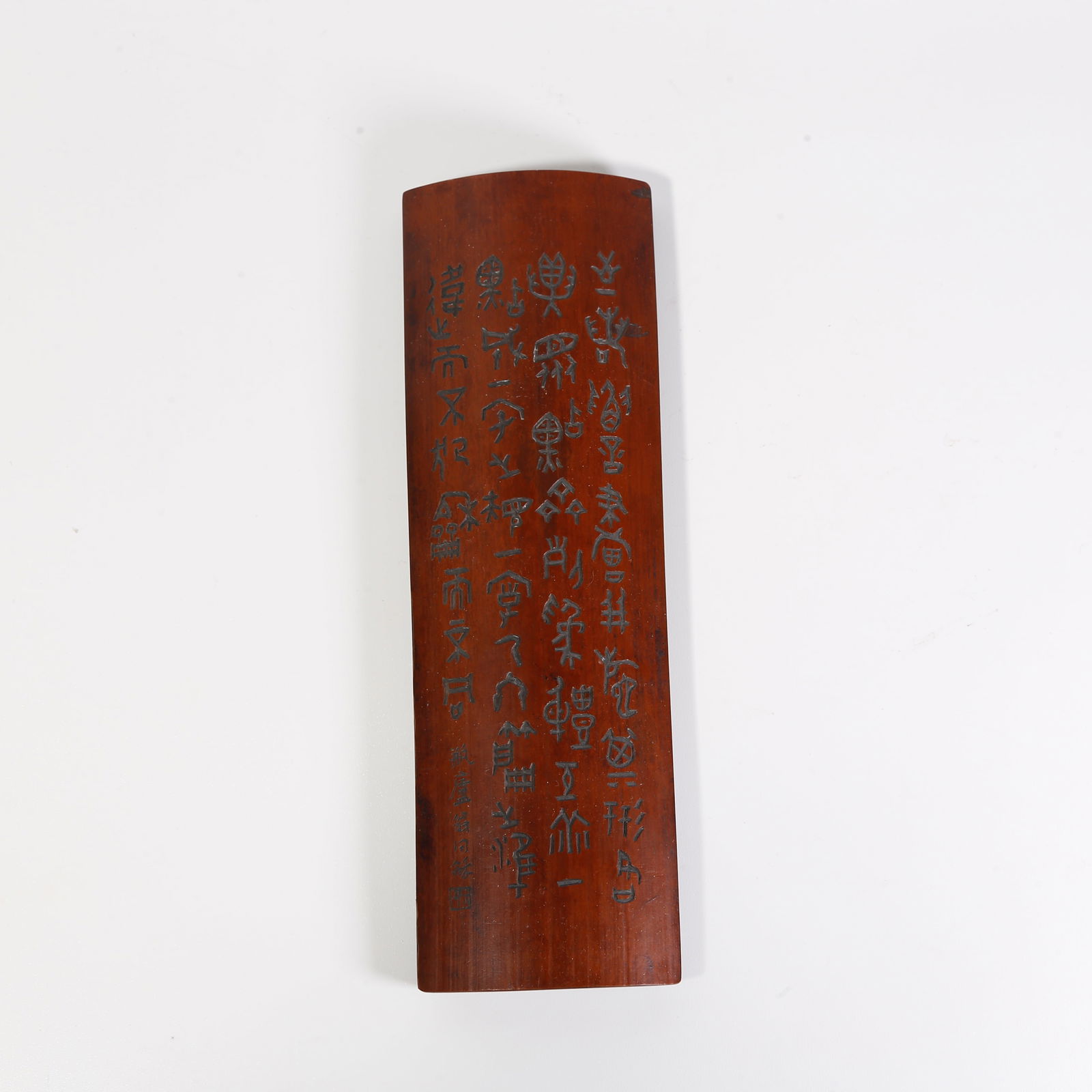 A BAMBOO-CARVED ARMREST WITH ENGRAVED POETIC INSCRIPTIONS: Bamboo-carved armrest with engraved poetic inscriptions