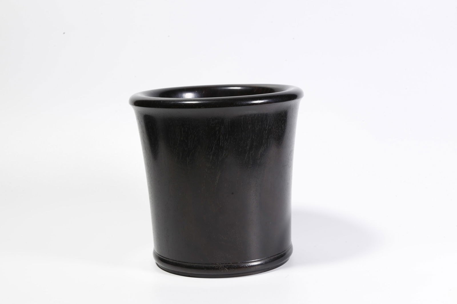 A ZITAN WOOD CARVED BRUSH POT: Zitan wood carved brush pot