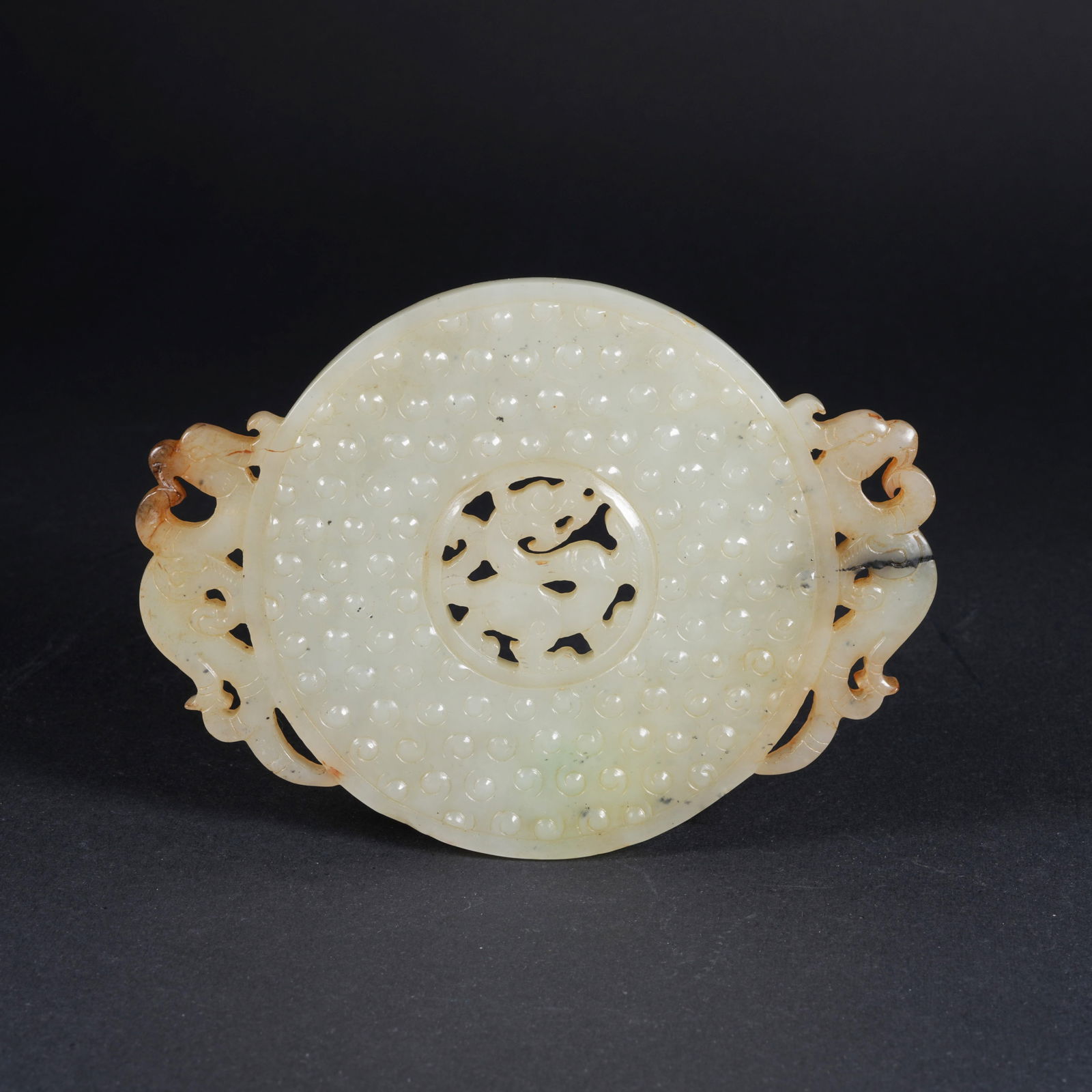 A ANCIENT JADE BI DISC WITH RAISED RIM (CHU KUO BI): Ancient jade bi disc with raised rim (chu kuo bi)