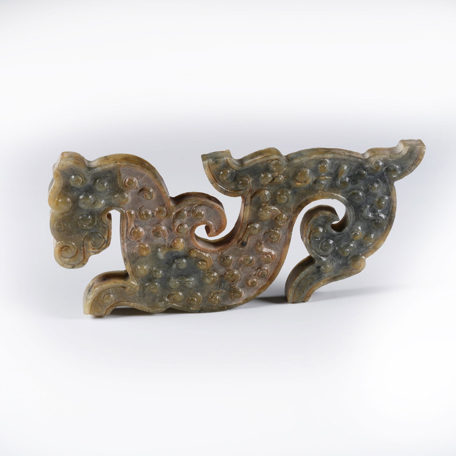 A ANCIENT JADE DRAGON-SHAPED PENDANT: Ancient jade dragon-shaped pendant