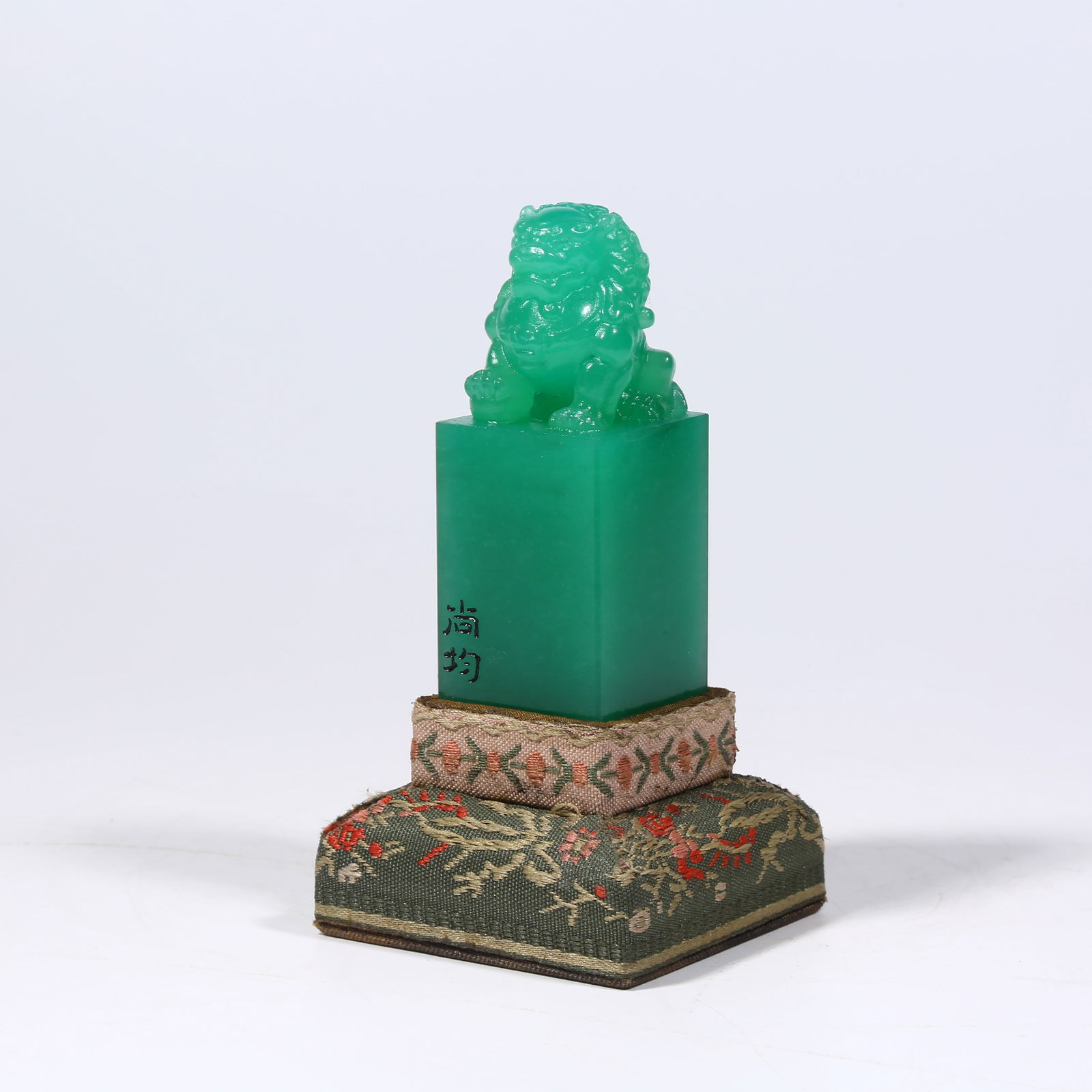 A SHOUSHAN AIYE GREEN STONE SEAL WITH LION KNOB: Shoushan Aiye Green stone seal with lion knob