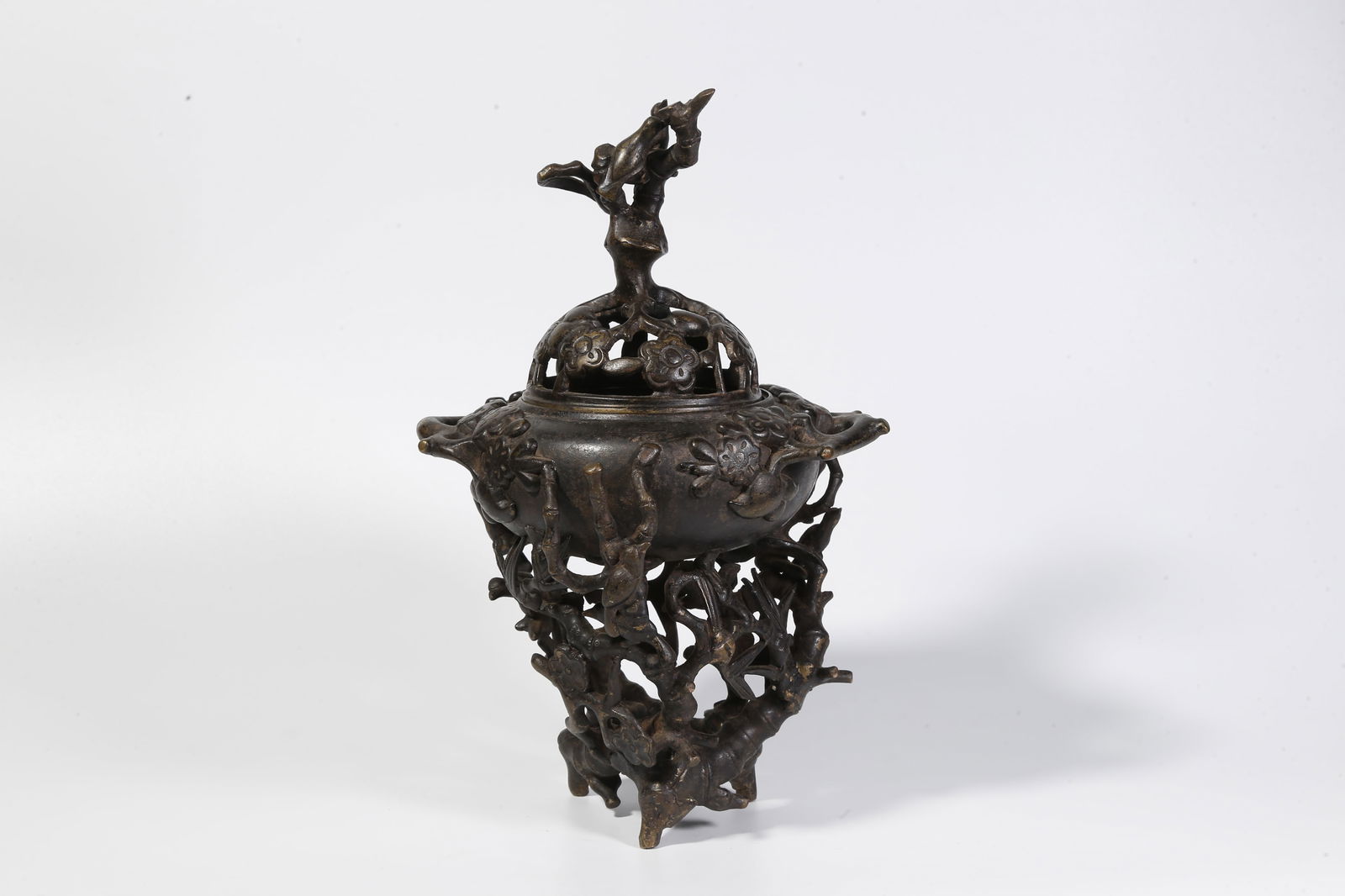 A BRONZE INCENSE BURNER WITH FLORAL-AND-BIRD MOTIF (1 of 10)