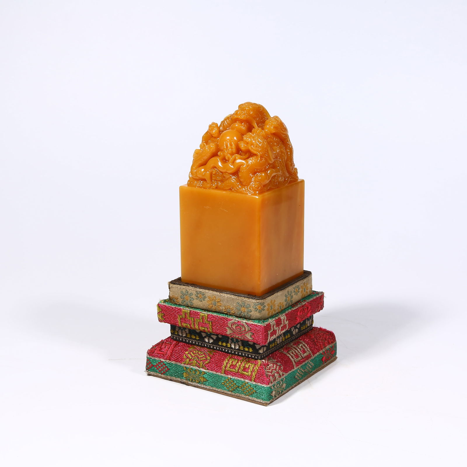 A SHOUSHAN TIANHUANG STONE SEAL WITH DRAGON KNOB: Shoushan Tianhuang stone seal with dragon knob